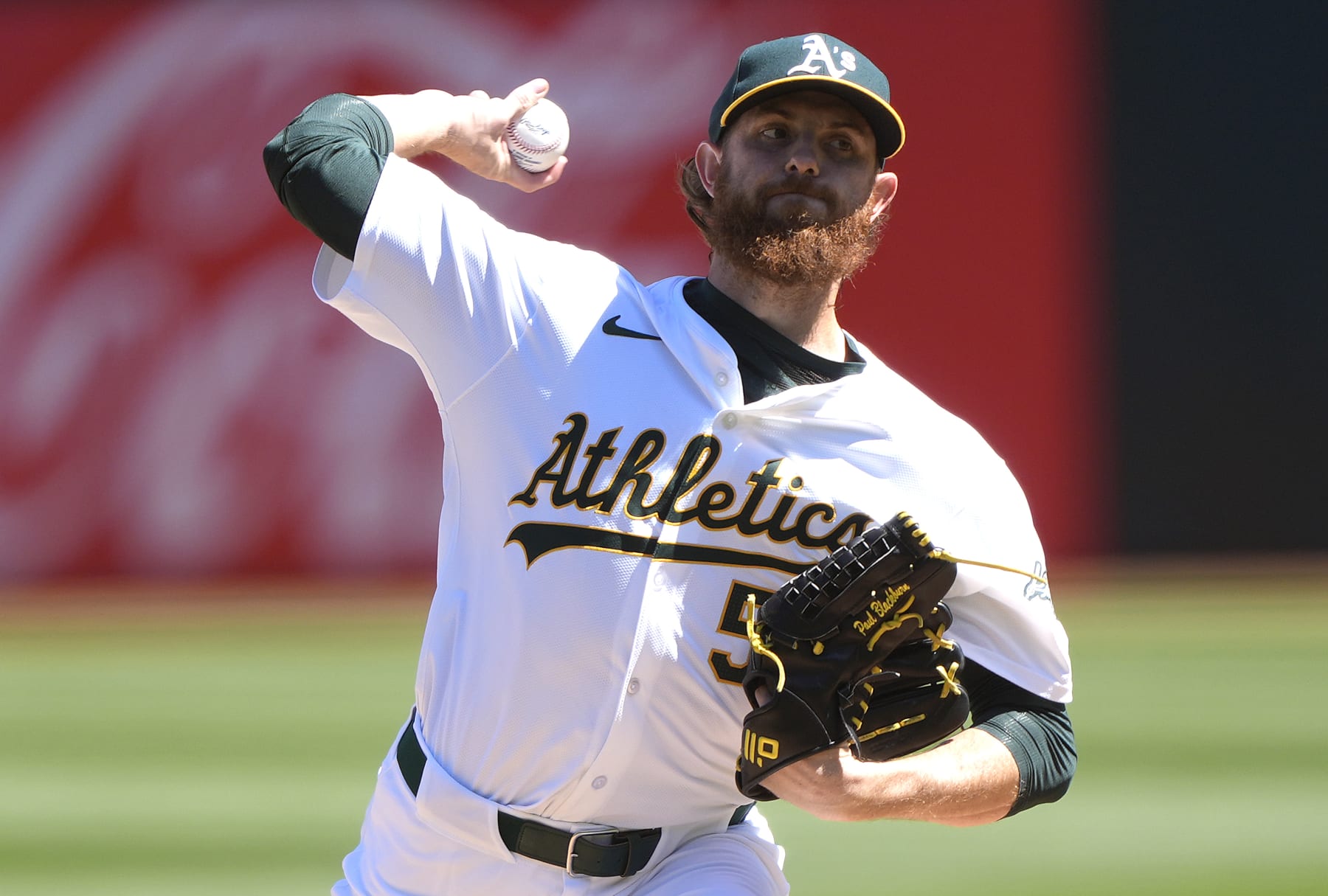 OAKLAND, CALIFORNIA - MARCH 31: Paul Blackburn #58 of the Oakland Athletics pitches against the Cleveland Guardians in the top of the first inning on March 31, 2024 at the Oakland Coliseum in Oakland, California. (Photo by Thearon W. Henderson/Getty Images)