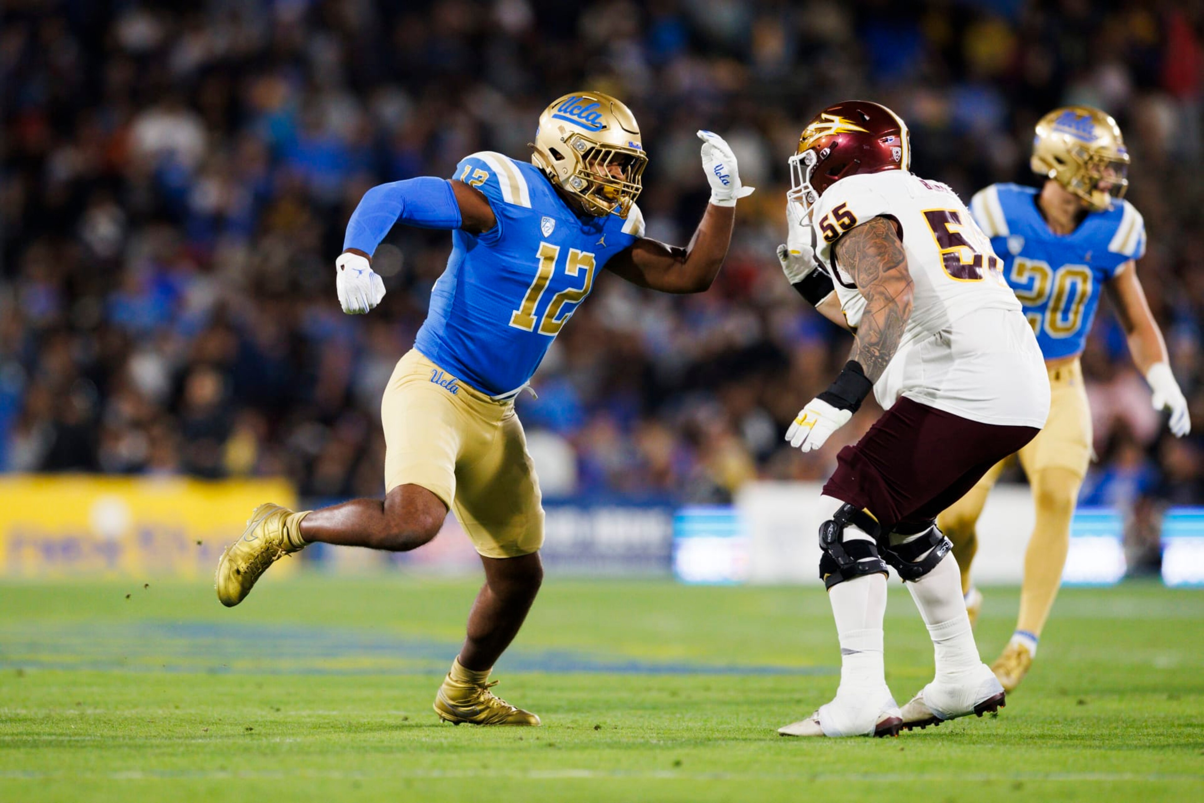 PASADENA, CA - NOVEMBER 11: UCLA Bruins defensive lineman Grayson Murphy (12) rushes the edge during a college football game against the Arizona State Sun Devils on November 11, 2023 at Rose Bowl Stadium in Pasadena, CA. (Photo by Ric Tapia/Icon Sportswire via Getty Images) PASADENA, CA - NOVEMBER 11: UCLA Bruins defensive lineman Grayson Murphy (12) rushes the edge during a college football game against the Arizona State Sun Devils on November 11, 2023 at Rose Bowl Stadium in Pasadena, CA. (Photo by Ric Tapia/Icon Sportswire via Getty Images)