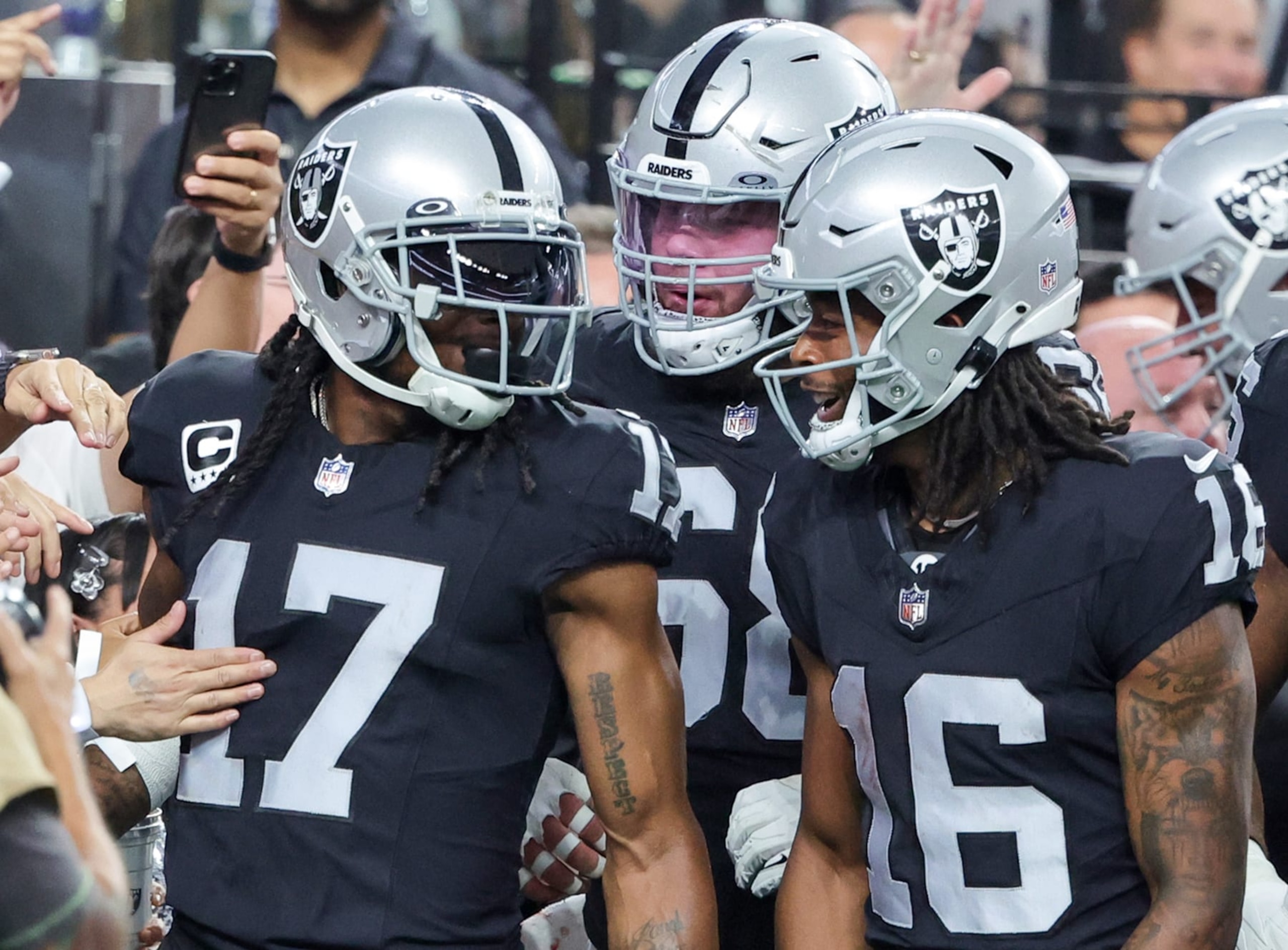 Raiders wide receiver Davante Adams (left), center Andre James (middle) and wide receiver Jakobi Meyers (right) Raiders wide receiver Davante Adams (left), center Andre James (middle) and wide receiver Jakobi Meyers (right)