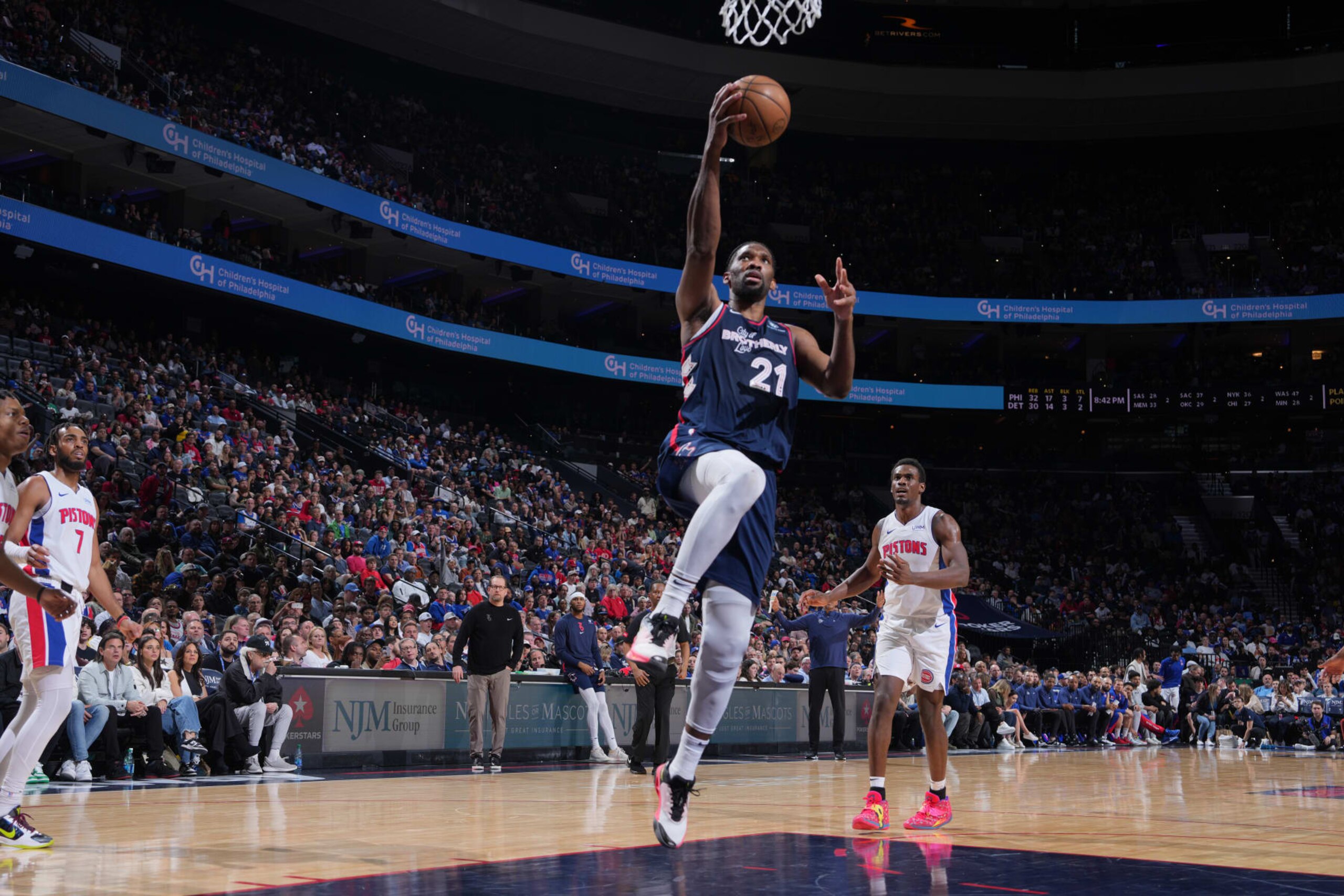 PHILADELPHIA, PA - APRIL 9: Joel Embiid #21 of the Philadelphia 76ers drives to the basket during the game against the Detroit Pistons on April 9, 2024 at the Wells Fargo Center in Philadelphia, Pennsylvania NOTE TO USER: User expressly acknowledges and agrees that, by downloading and/or using this Photograph, user is consenting to the terms and conditions of the Getty Images License Agreement. Mandatory Copyright Notice: Copyright 2024 NBAE (Photo by Jesse D. Garrabrant/NBAE via Getty Images) PHILADELPHIA, PA - APRIL 9: Joel Embiid #21 of the Philadelphia 76ers drives to the basket during the game against the Detroit Pistons on April 9, 2024 at the Wells Fargo Center in Philadelphia, Pennsylvania NOTE TO USER: User expressly acknowledges and agrees that, by downloading and/or using this Photograph, user is consenting to the terms and conditions of the Getty Images License Agreement. Mandatory Copyright Notice: Copyright 2024 NBAE (Photo by Jesse D. Garrabrant/NBAE via Getty Images)