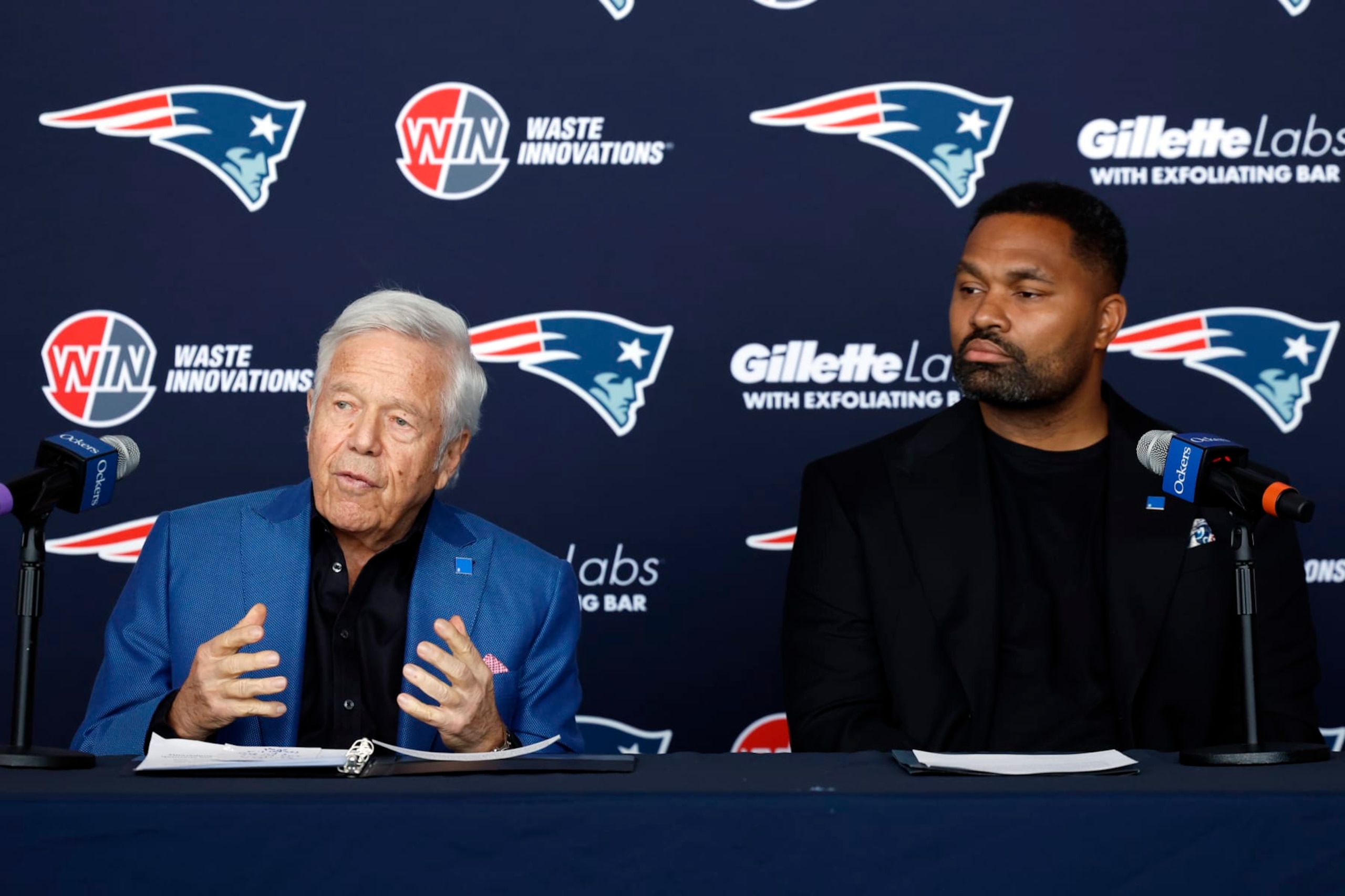 Foxborough, MA - January 17: New England Patriots owner Robert Kraft, left, and head coach Jerod Mayo speak during Mayo's introductory press conference at Gillette Stadium. (Photo by Danielle Parhizkaran/The Boston Globe via Getty Images) Foxborough, MA - January 17: New England Patriots owner Robert Kraft, left, and head coach Jerod Mayo speak during Mayo's introductory press conference at Gillette Stadium. (Photo by Danielle Parhizkaran/The Boston Globe via Getty Images)