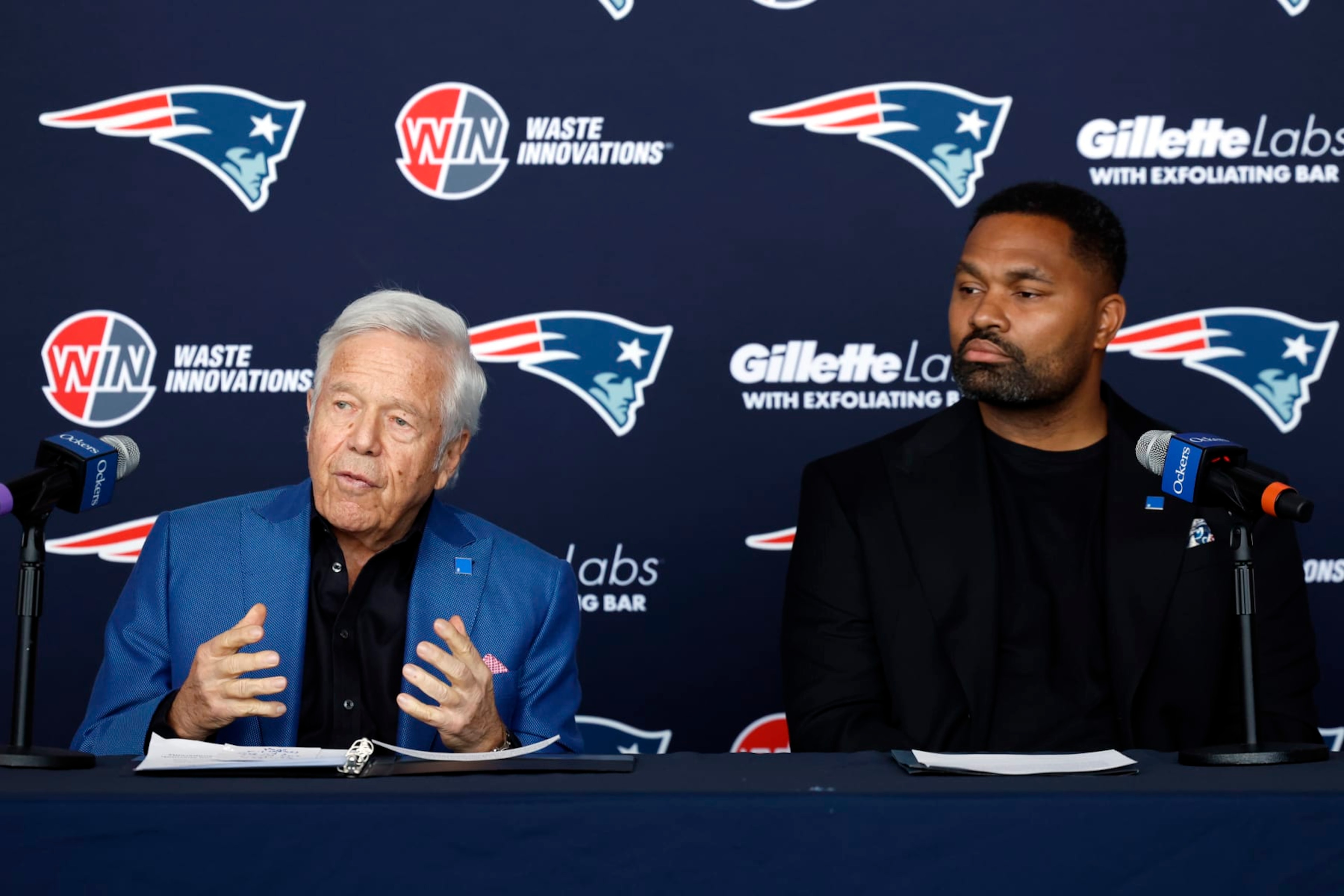 Foxborough, MA - January 17: New England Patriots owner Robert Kraft, left, and head coach Jerod Mayo speak during Mayo's introductory press conference at Gillette Stadium. (Photo by Danielle Parhizkaran/The Boston Globe via Getty Images)