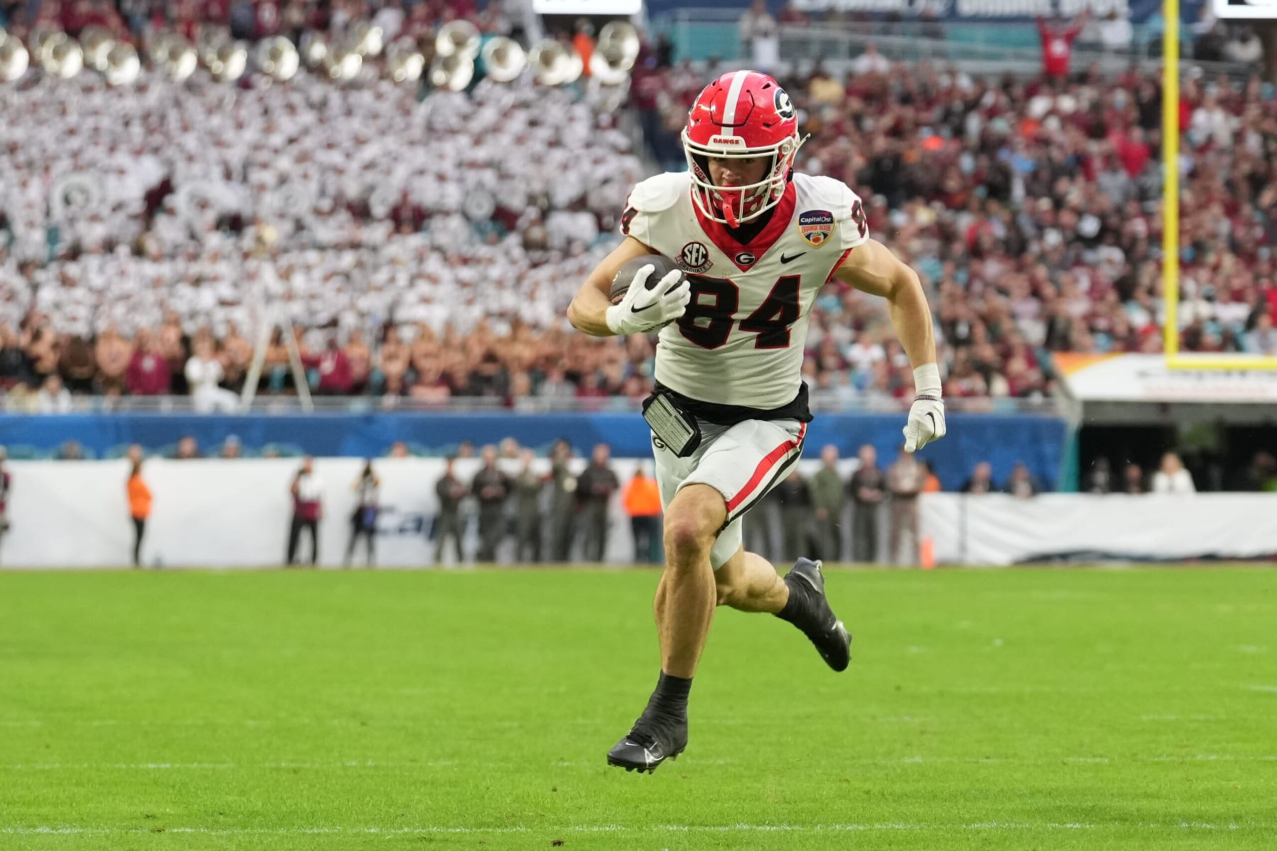 MIAMI GARDENS, FL - DECEMBER 30: Georgia Bulldogs wide receiver Ladd McConkey (84) races for the end zone during the Capital One Orange Bowl game between the Georgia Bulldogs and the Florida State Seminoles on Saturday, December 30, 2023 at Hard Rock Stadium, Miami Gardens, Fla. (Photo by Peter Joneleit/Icon Sportswire via Getty Images) MIAMI GARDENS, FL - DECEMBER 30: Georgia Bulldogs wide receiver Ladd McConkey (84) races for the end zone during the Capital One Orange Bowl game between the Georgia Bulldogs and the Florida State Seminoles on Saturday, December 30, 2023 at Hard Rock Stadium, Miami Gardens, Fla. (Photo by Peter Joneleit/Icon Sportswire via Getty Images)