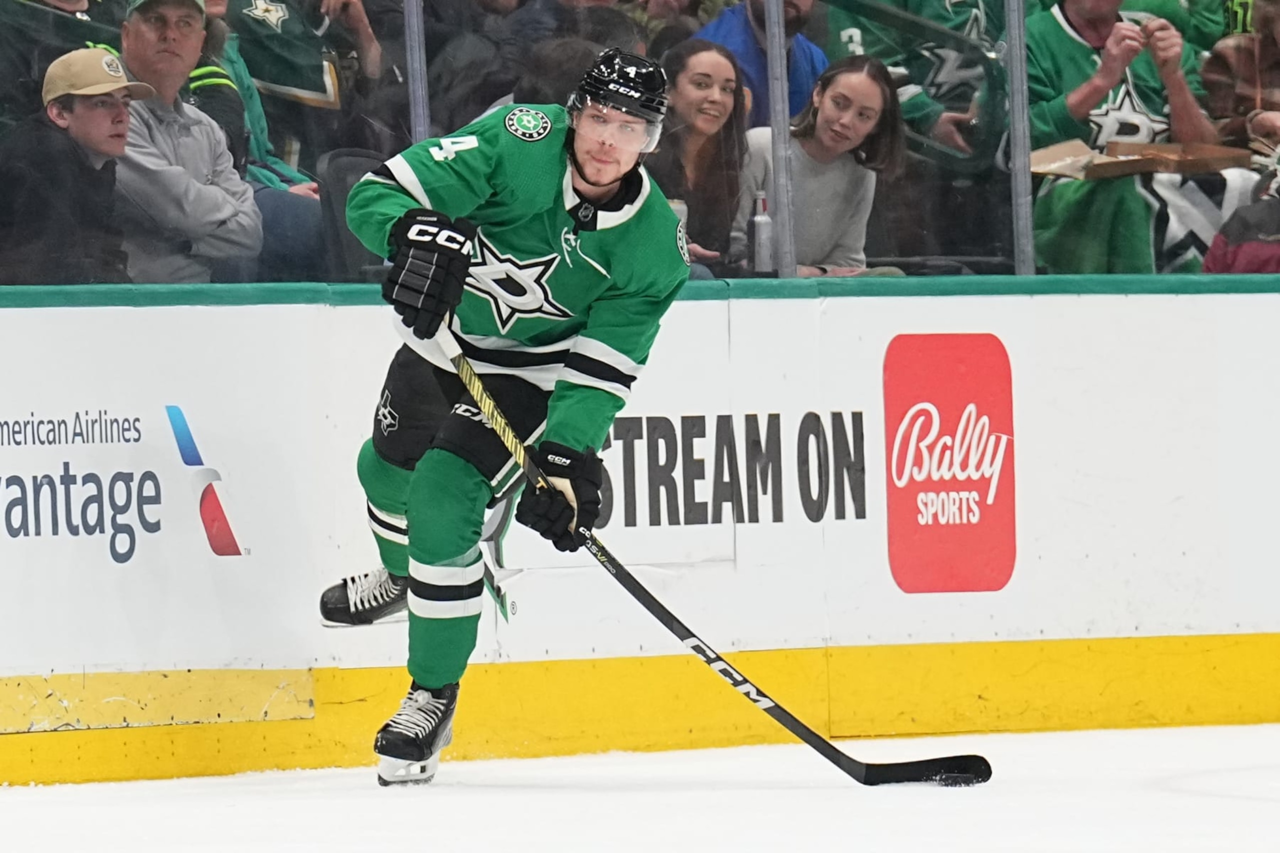 DALLAS, TX - APRIL 9: Miro Heiskanen #4 of the Dallas Stars handles the puck against the Buffalo Sabers at the American Airlines Center on April 9, 2024 in Dallas, Texas. (Photo by Glenn James/NHLI via Getty Images)