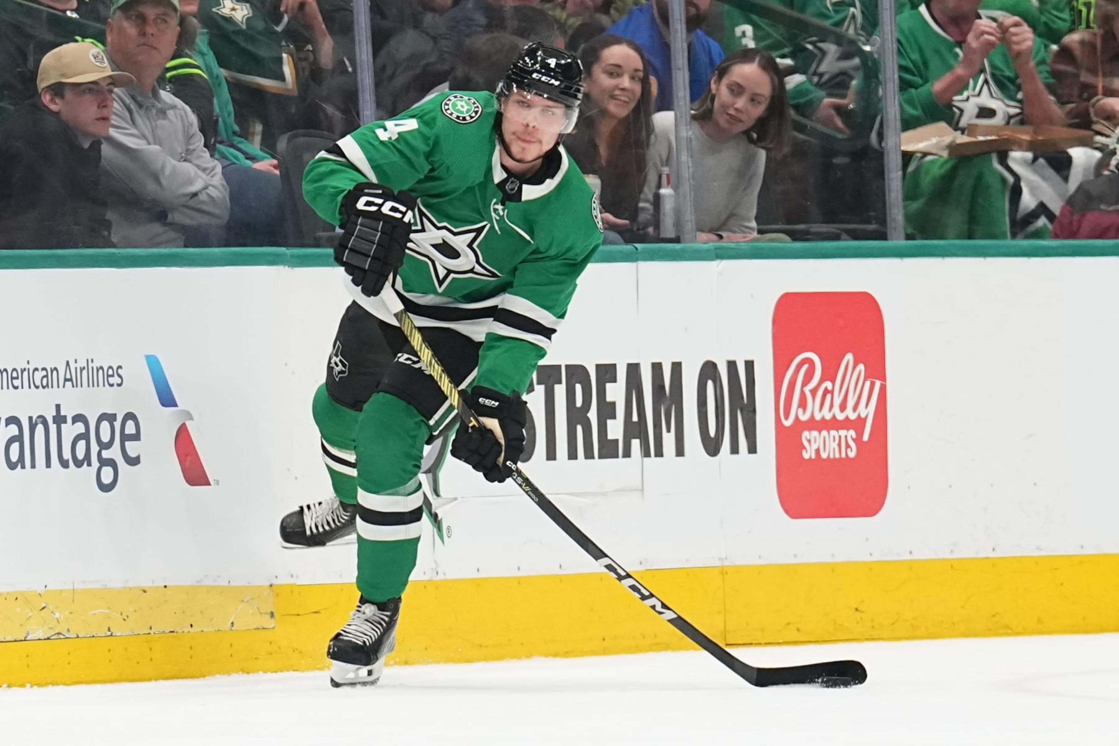 DALLAS, TX - APRIL 9: Miro Heiskanen #4 of the Dallas Stars handles the puck against the Buffalo Sabers at the American Airlines Center on April 9, 2024 in Dallas, Texas. (Photo by Glenn James/NHLI via Getty Images)