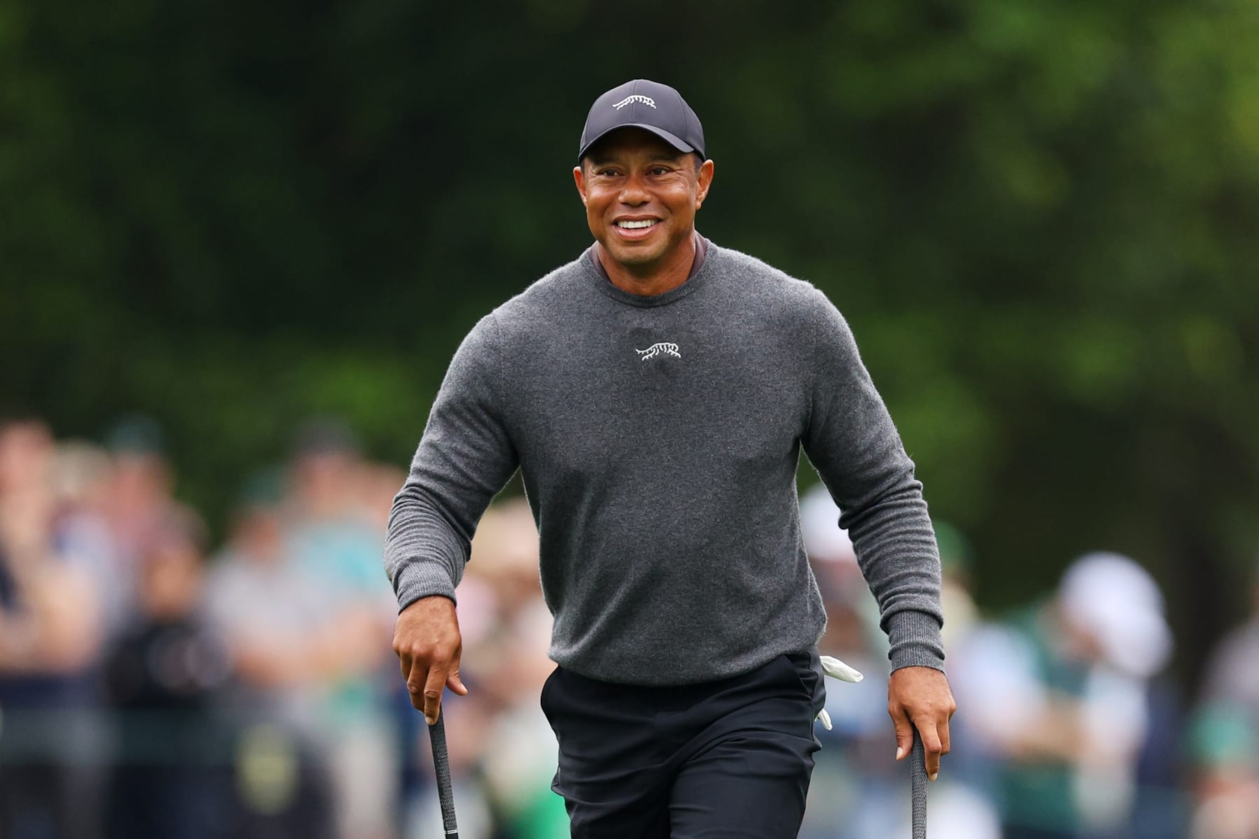 AUGUSTA, GEORGIA - APRIL 09: Tiger Woods of the United States reacts on the eighth hole during a practice round prior to the 2024 Masters Tournament at Augusta National Golf Club on April 09, 2024 in Augusta, Georgia. (Photo by Andrew Redington/Getty Images)