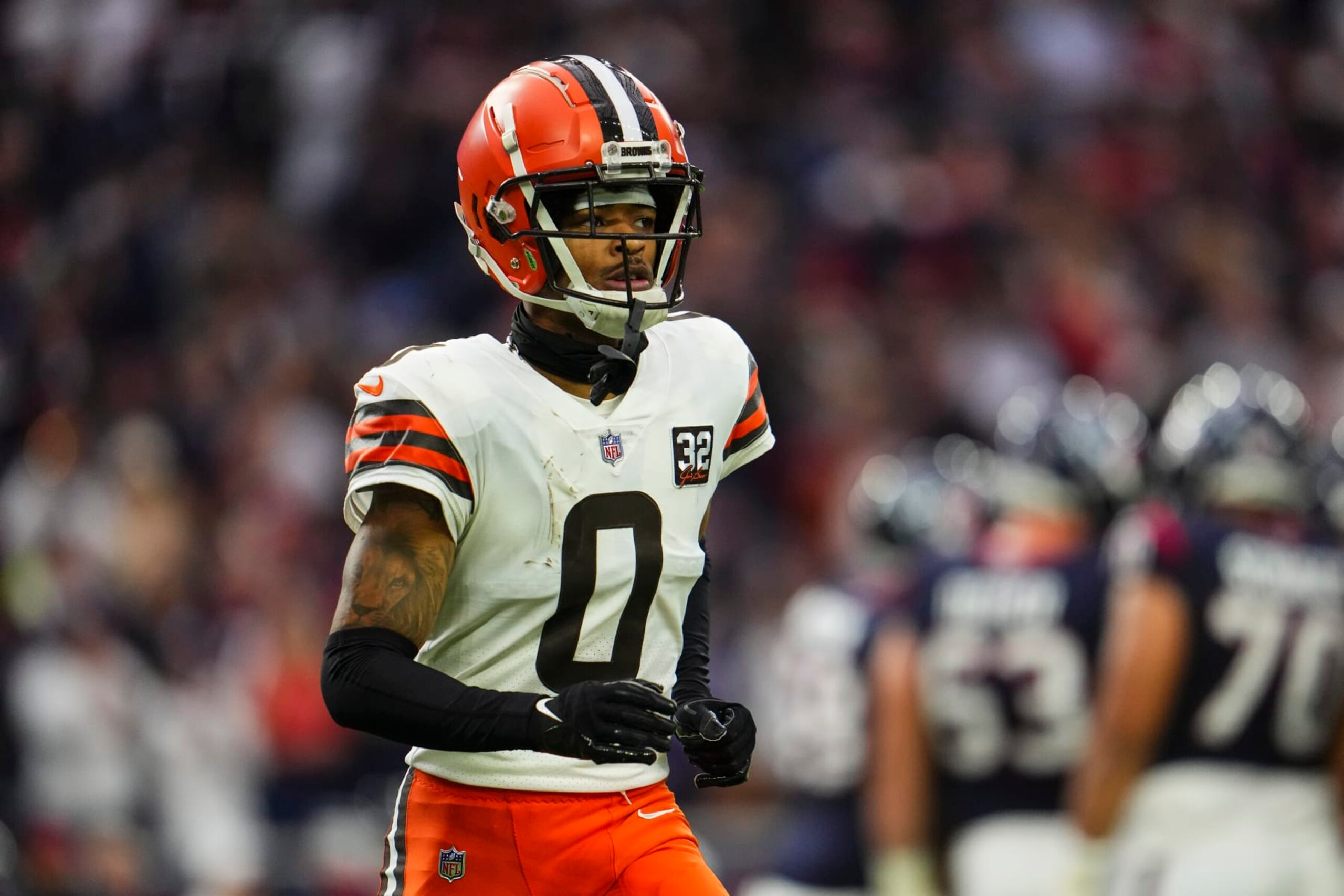 HOUSTON, TX - JANUARY 13: Greg Newsome II #0 of the Cleveland Browns looks on from the field during an NFL wild-card playoff football game against the Houston Texans at NRG Stadium on January 13, 2024 in Houston, Texas. (Photo by Cooper Neill/Getty Images)