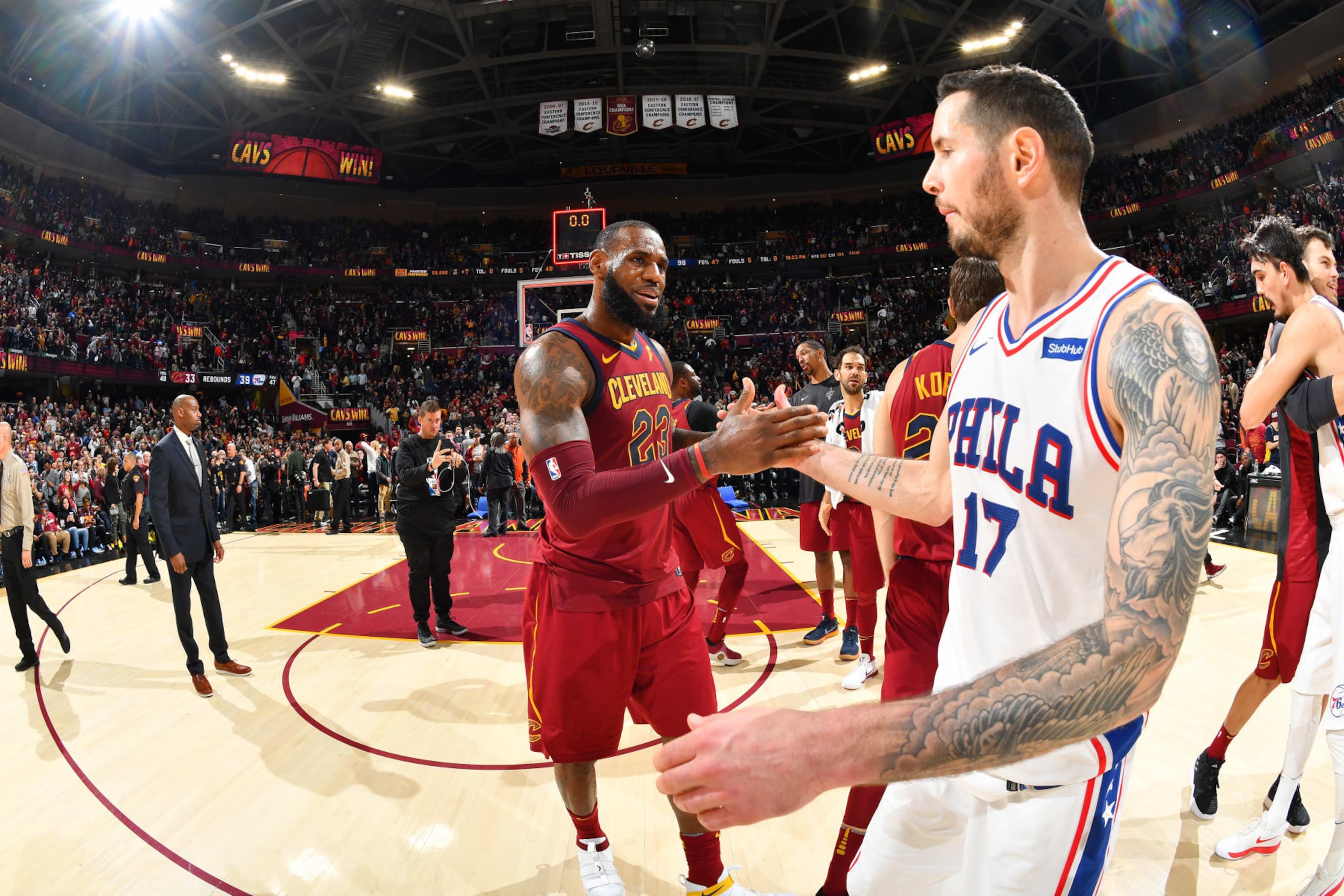 CLEVELAND, OH - DECEMBER 9: LeBron James #23 of the Cleveland Cavaliers and JJ Redick #17 of the Philadelphia 76ers high five on the court after the game on December 9, 2017 at Quicken Loans Arena in Cleveland, Ohio. NOTE TO USER: User expressly acknowledges and agrees that, by downloading and or using this Photograph, user is consenting to the terms and conditions of the Getty Images License Agreement. Mandatory Copyright Notice: Copyright 2017 NBAE (Photo by Jesse D. Garrabrant/NBAE via Getty Images) CLEVELAND, OH - DECEMBER 9: LeBron James #23 of the Cleveland Cavaliers and JJ Redick #17 of the Philadelphia 76ers high five on the court after the game on December 9, 2017 at Quicken Loans Arena in Cleveland, Ohio. NOTE TO USER: User expressly acknowledges and agrees that, by downloading and or using this Photograph, user is consenting to the terms and conditions of the Getty Images License Agreement. Mandatory Copyright Notice: Copyright 2017 NBAE (Photo by Jesse D. Garrabrant/NBAE via Getty Images)