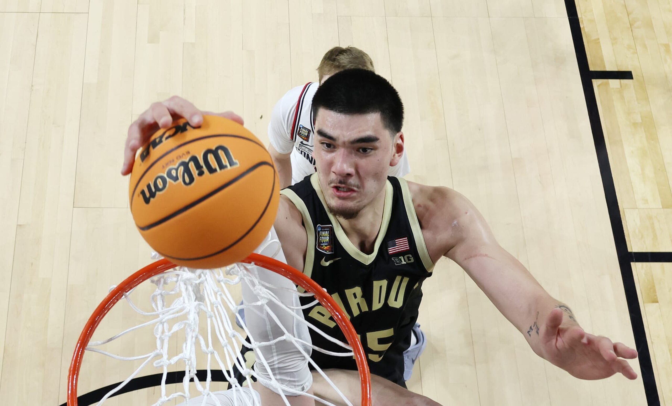 GLENDALE, ARIZONA - APRIL 08: (EDITORS NOTE: Image taken using a remote camera.) Zach Edey #15 of the Purdue Boilermakers dunks the ball during the second half in the NCAA Men's Basketball Tournament National Championship game at State Farm Stadium on April 08, 2024 in Glendale, Arizona. (Photo by Brett Wilhelm/NCAA Photos via Getty Images)