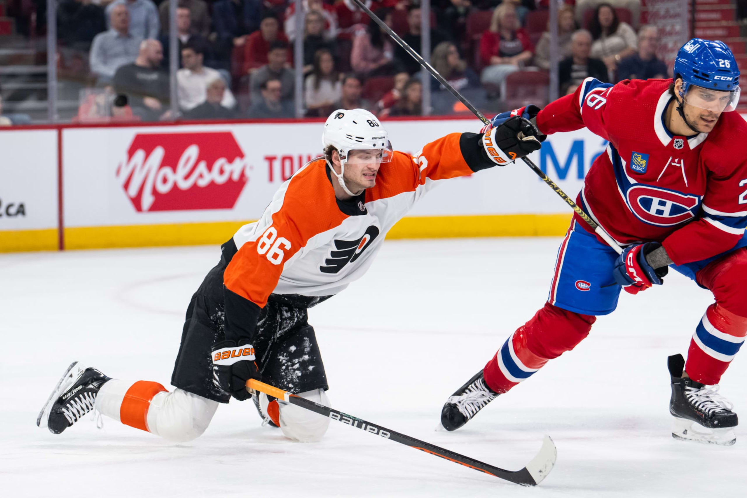 MONTREAL, QC - APRIL 09: Joel Farabee (86) of the Philadelphia Flyers grabs Johnathan Kovacevic (26) of the Montreal Canadiens while falling during the first period of the NHL game between the Philadelphia Flyers and the Montreal Canadiens on April 9, 2024, at the Bell Centre in Montreal, QC (Photo by Vincent Ethier/Icon Sportswire via Getty Images) MONTREAL, QC - APRIL 09: Joel Farabee (86) of the Philadelphia Flyers grabs Johnathan Kovacevic (26) of the Montreal Canadiens while falling during the first period of the NHL game between the Philadelphia Flyers and the Montreal Canadiens on April 9, 2024, at the Bell Centre in Montreal, QC (Photo by Vincent Ethier/Icon Sportswire via Getty Images)