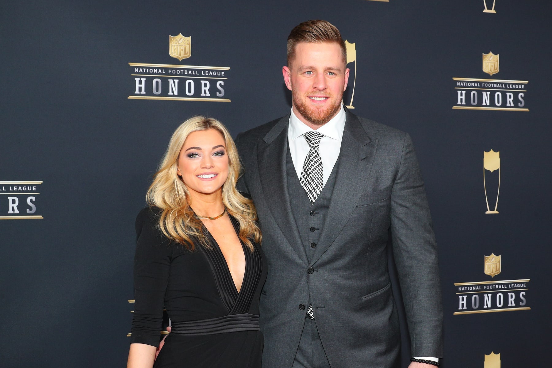 MINNEAPOLIS, MN - FEBRUARY 03:  JJ Watt and girlfriend Kealia Ohai pose for Photographs on the Red Carpet at NFL Honors during Super Bowl LII week on February 3, 2018, at Northrop at the University of Minnesota in Minneapolis, MN.  (Photo by Rich Graessle/Icon Sportswire via Getty Images)