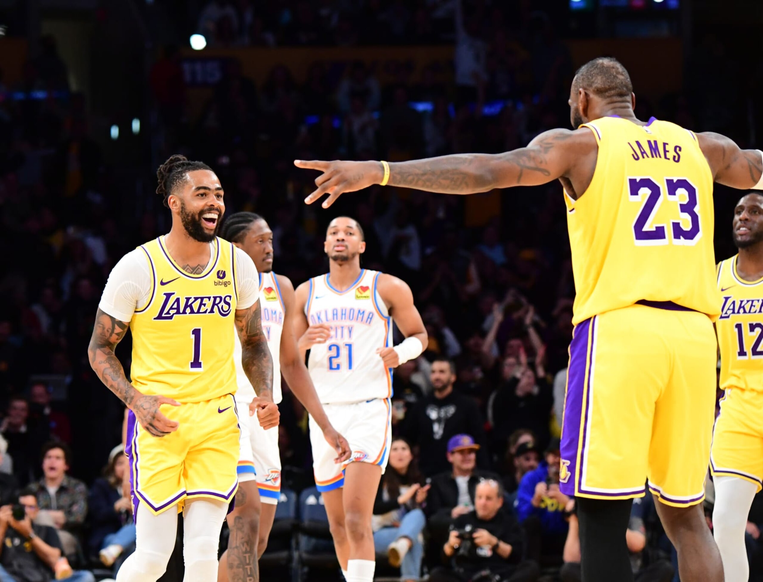 LOS ANGELES, CA - MARCH 4: D'Angelo Russell #1 and LeBron James #23 of the Los Angeles Lakers celebrates during the game against the Oklahoma City Thunder on March 4, 2024 at Crypto.Com Arena in Los Angeles, California. NOTE TO USER: User expressly acknowledges and agrees that, by downloading and/or using this Photograph, user is consenting to the terms and conditions of the Getty Images License Agreement. Mandatory Copyright Notice: Copyright 2024 NBAE (Photo by Adam Pantozzi/NBAE via Getty Images) LOS ANGELES, CA - MARCH 4: D'Angelo Russell #1 and LeBron James #23 of the Los Angeles Lakers celebrates during the game against the Oklahoma City Thunder on March 4, 2024 at Crypto.Com Arena in Los Angeles, California. NOTE TO USER: User expressly acknowledges and agrees that, by downloading and/or using this Photograph, user is consenting to the terms and conditions of the Getty Images License Agreement. Mandatory Copyright Notice: Copyright 2024 NBAE (Photo by Adam Pantozzi/NBAE via Getty Images)