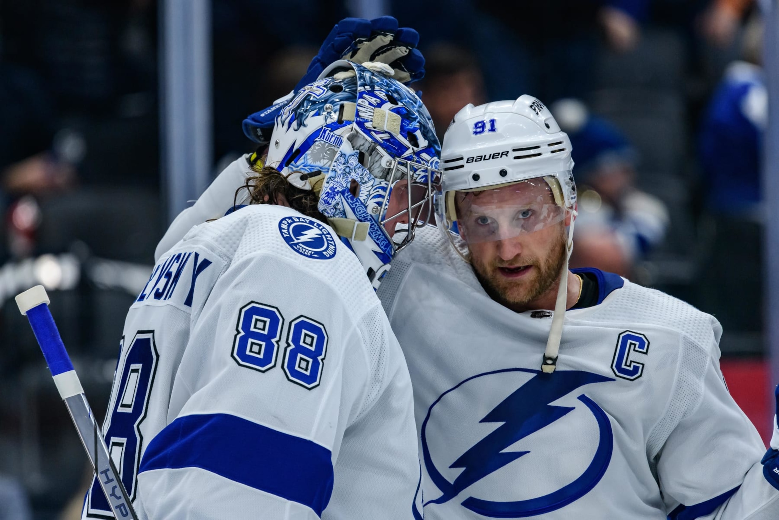 TORONTO, ON - APRIL 03: Tampa Bay Lightning Goalie Andrei Vasilevskiy (88) celebrates the win with Tampa Bay Lightning Winger Steven Stamkos (91) after the NHL regular season game between the Tampa Bay Lightning and the Toronto Maple Leafs on April 3, 2024, at Scotiabank Arena in Toronto, ON, Canada. (Photo by Julian Avram/Icon Sportswire via Getty Images) TORONTO, ON - APRIL 03: Tampa Bay Lightning Goalie Andrei Vasilevskiy (88) celebrates the win with Tampa Bay Lightning Winger Steven Stamkos (91) after the NHL regular season game between the Tampa Bay Lightning and the Toronto Maple Leafs on April 3, 2024, at Scotiabank Arena in Toronto, ON, Canada. (Photo by Julian Avram/Icon Sportswire via Getty Images)