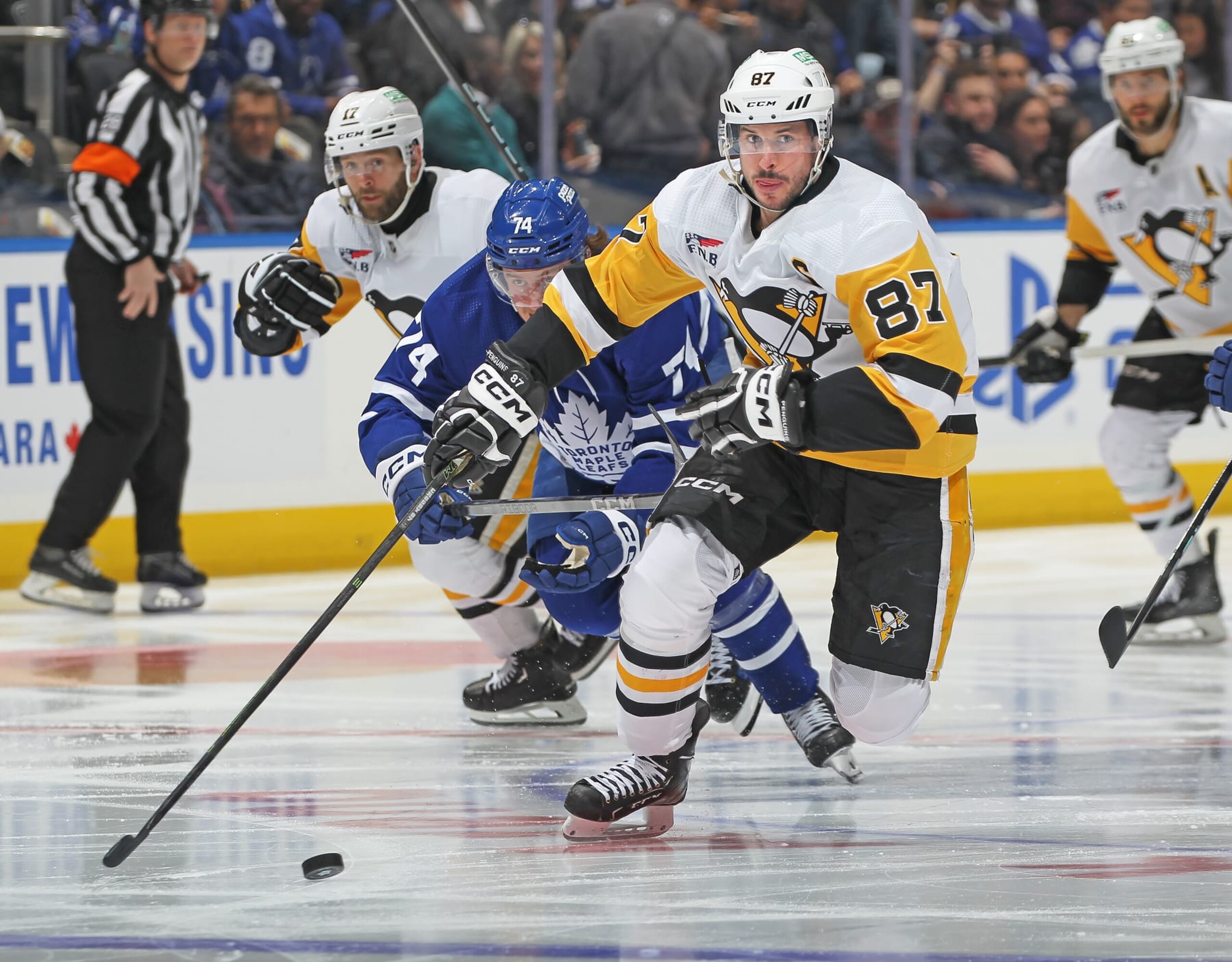 TORONTO, CANADA - APRIL 8: Sidney Crosby #87 of the Pittsburgh Penguins skates the puck against the Toronto Maple Leafs during the third period at Scotiabank Arena on April 8, 2024 in Toronto, Ontario, Canada. The Maple Leafs defeated the Penguins 3-2 in overtime. (Photo by Claus Andersen/Getty Images) TORONTO, CANADA - APRIL 8: Sidney Crosby #87 of the Pittsburgh Penguins skates the puck against the Toronto Maple Leafs during the third period at Scotiabank Arena on April 8, 2024 in Toronto, Ontario, Canada. The Maple Leafs defeated the Penguins 3-2 in overtime. (Photo by Claus Andersen/Getty Images)