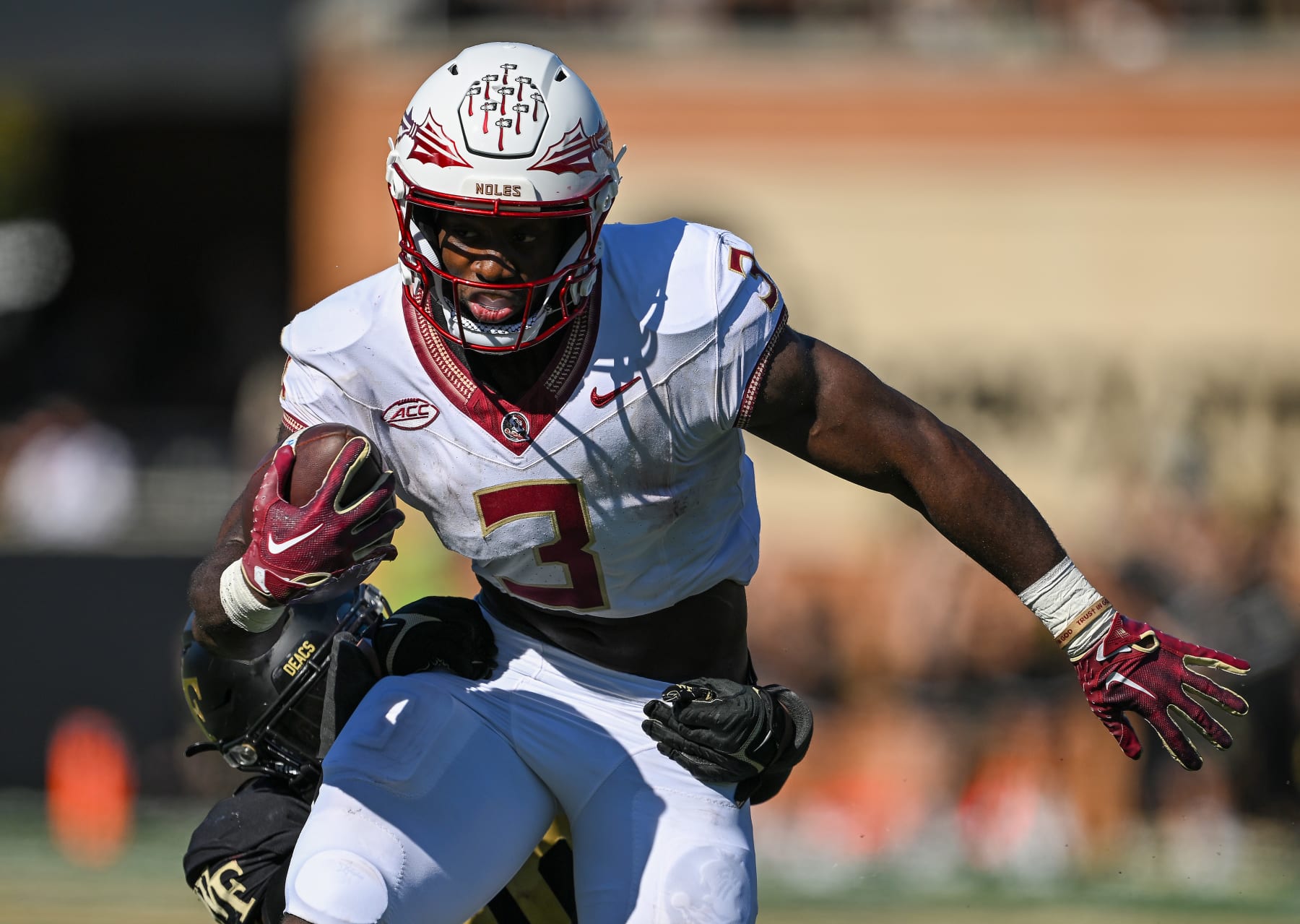 WINSTON-SALEM, NORTH CAROLINA - OCTOBER 28: Trey Benson #3 of the Florida State Seminoles runs against the Wake Forest Demon Deacons during their game at Truist Field on October 28, 2023 in Winston-Salem, North Carolina. Florida State won 41-16. (Photo by Grant Halverson/Getty Images)