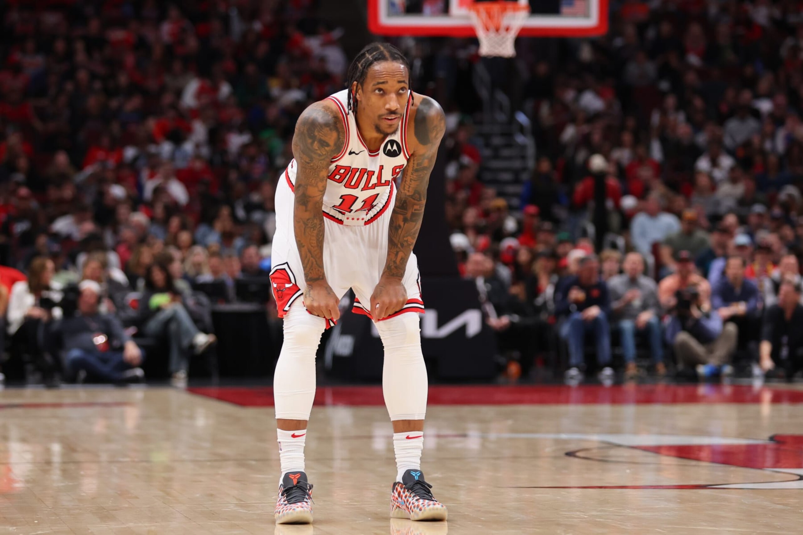CHICAGO, ILLINOIS - APRIL 09: DeMar DeRozan #11 of the Chicago Bulls reacts against the New York Knicks during the first half at the United Center on April 09, 2024 in Chicago, Illinois. NOTE TO USER: User expressly acknowledges and agrees that, by downloading and or using this photograph, User is consenting to the terms and conditions of the Getty Images License Agreement.  (Photo by Michael Reaves/Getty Images)