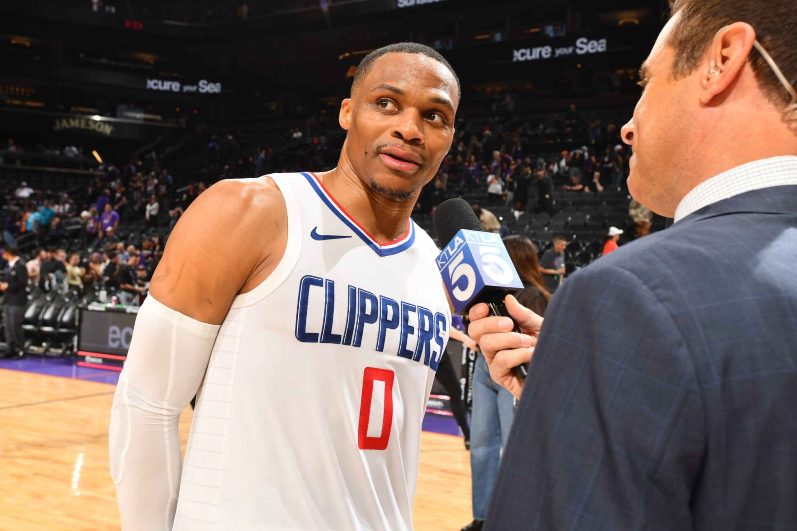 PHOENIX, AZ - APRIL 9:  Russell Westbrook #0 of the LA Clippers talks to the media after the game  on April 9, 2024 at Footprint Center in Phoenix, Arizona. NOTE TO USER: User expressly acknowledges and agrees that, by downloading and or using this photograph, user is consenting to the terms and conditions of the Getty Images License Agreement. Mandatory Copyright Notice: Copyright 2024 NBAE (Photo by Barry Gossage/NBAE via Getty Images)