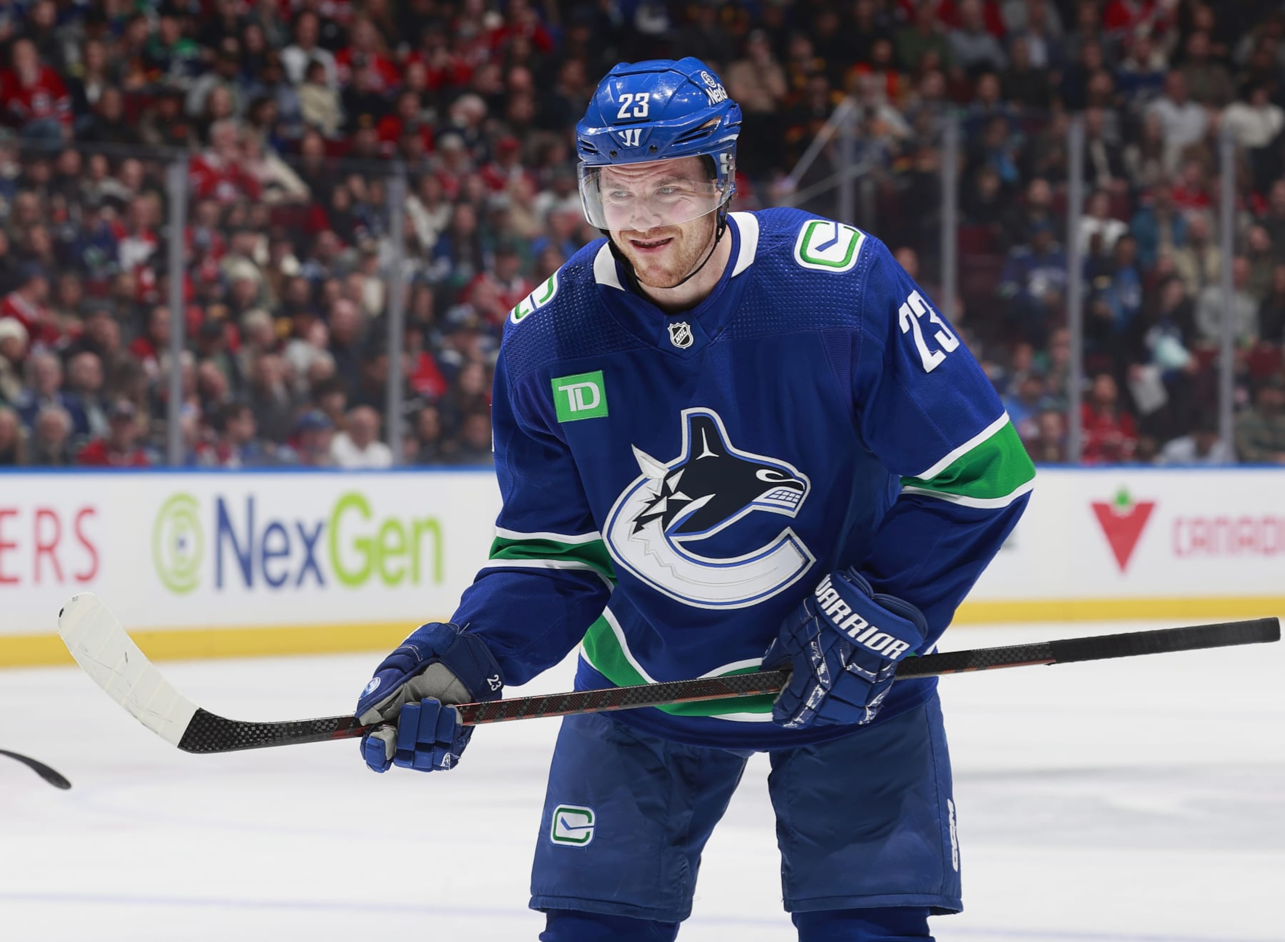 VANCOUVER, CANADA - MARCH 21: Elias Lindholm #23 of the Vancouver Canucks lines up for a face off during their NHL game against the Montréal Canadiens at Rogers Arena on March 21, 2024 in Vancouver, British Columbia, Canada. (Photo by Jeff Vinnick/NHLI via Getty Images) VANCOUVER, CANADA - MARCH 21: Elias Lindholm #23 of the Vancouver Canucks lines up for a face off during their NHL game against the Montréal Canadiens at Rogers Arena on March 21, 2024 in Vancouver, British Columbia, Canada. (Photo by Jeff Vinnick/NHLI via Getty Images)