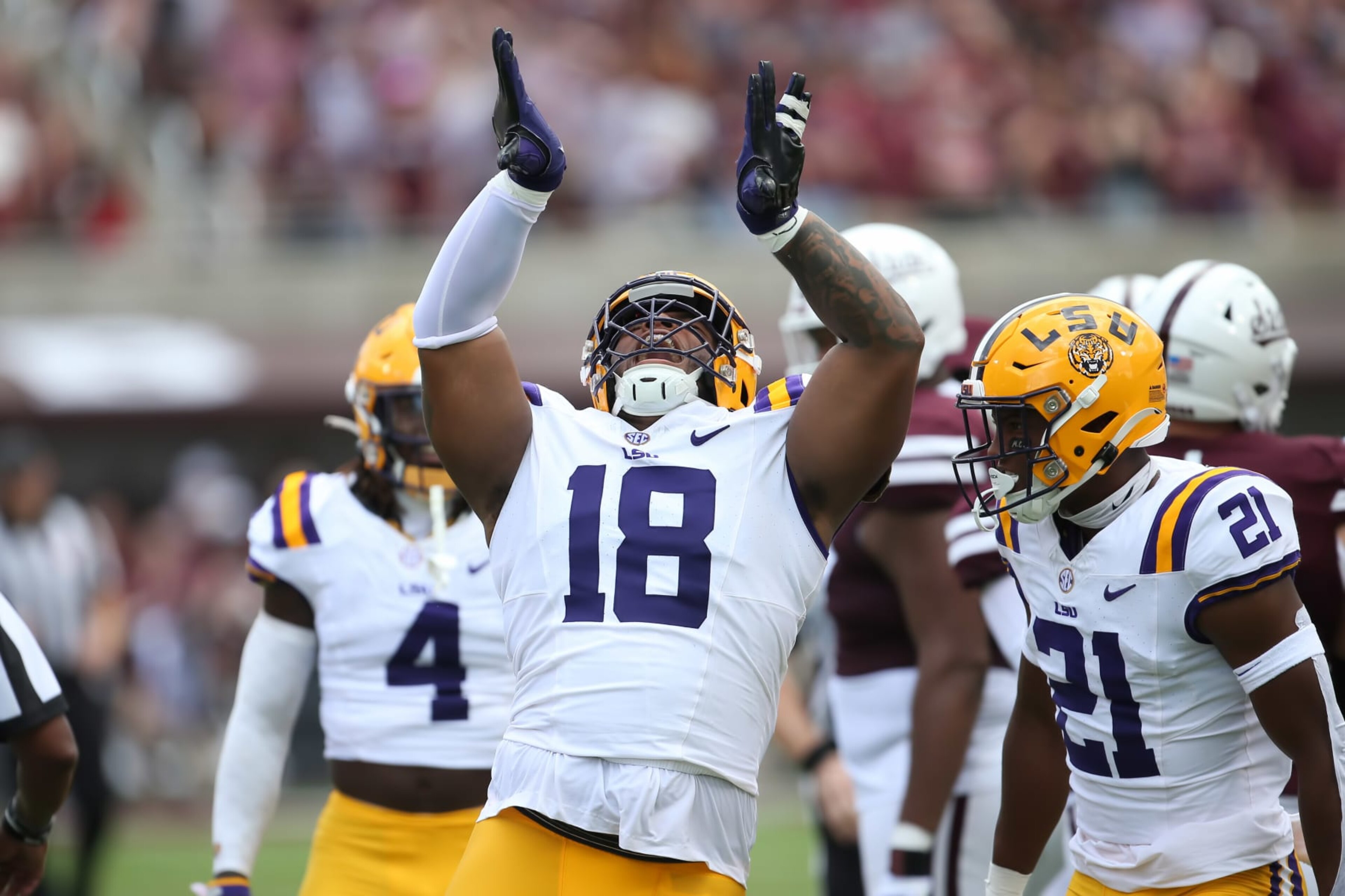 STARKVILLE, MS - SEPTEMBER 16: LSU Tigers defensive tackle Mekhi Wingo (18) celebrates a quarterback sack during the game between the Mississippi State Bulldogs and the LSU Tigers on September 16, 2023 at Davis Wade Stadium in Starkville, Mississippi.  (Photo by Michael Wade/Icon Sportswire via Getty Images)