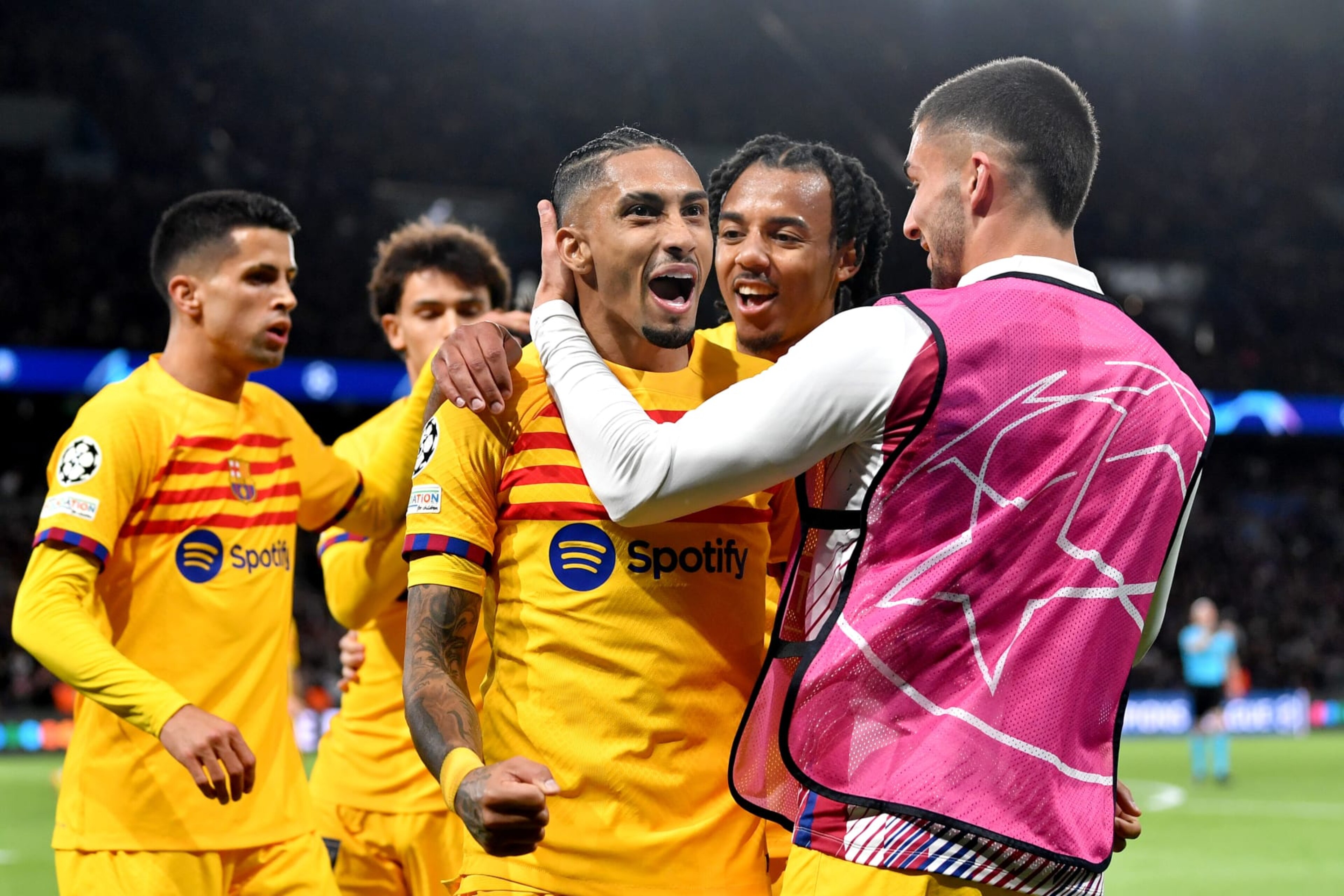 PARIS, FRANCE - APRIL 10: Raphinha of FC Barcelona celebrates with teammates after scoring his team's second goal during the UEFA Champions League quarter-final first leg match between Paris Saint-Germain and FC Barcelona at Parc des Princes on April 10, 2024 in Paris, France. (Photo by Valerio Pennicino - UEFA/UEFA via Getty Images) PARIS, FRANCE - APRIL 10: Raphinha of FC Barcelona celebrates with teammates after scoring his team's second goal during the UEFA Champions League quarter-final first leg match between Paris Saint-Germain and FC Barcelona at Parc des Princes on April 10, 2024 in Paris, France. (Photo by Valerio Pennicino - UEFA/UEFA via Getty Images)