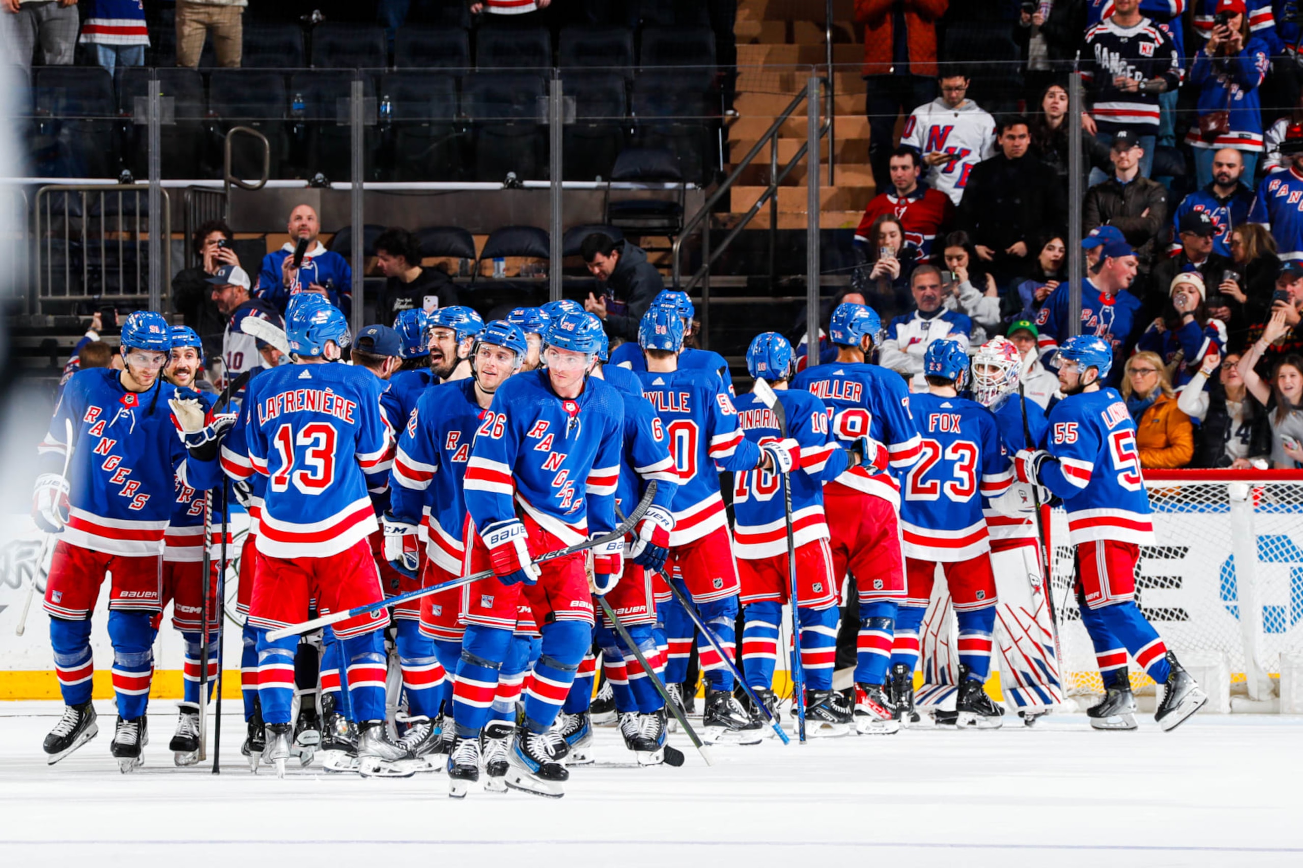 NEW YORK, NEW YORK - APRIL 07:  The New York Rangers celebrate a 5-2 win against the Montreal Canadiens at Madison Square Garden on April 7, 2024 in New York City. (Photo by Jared Silber/NHLI via Getty Images)