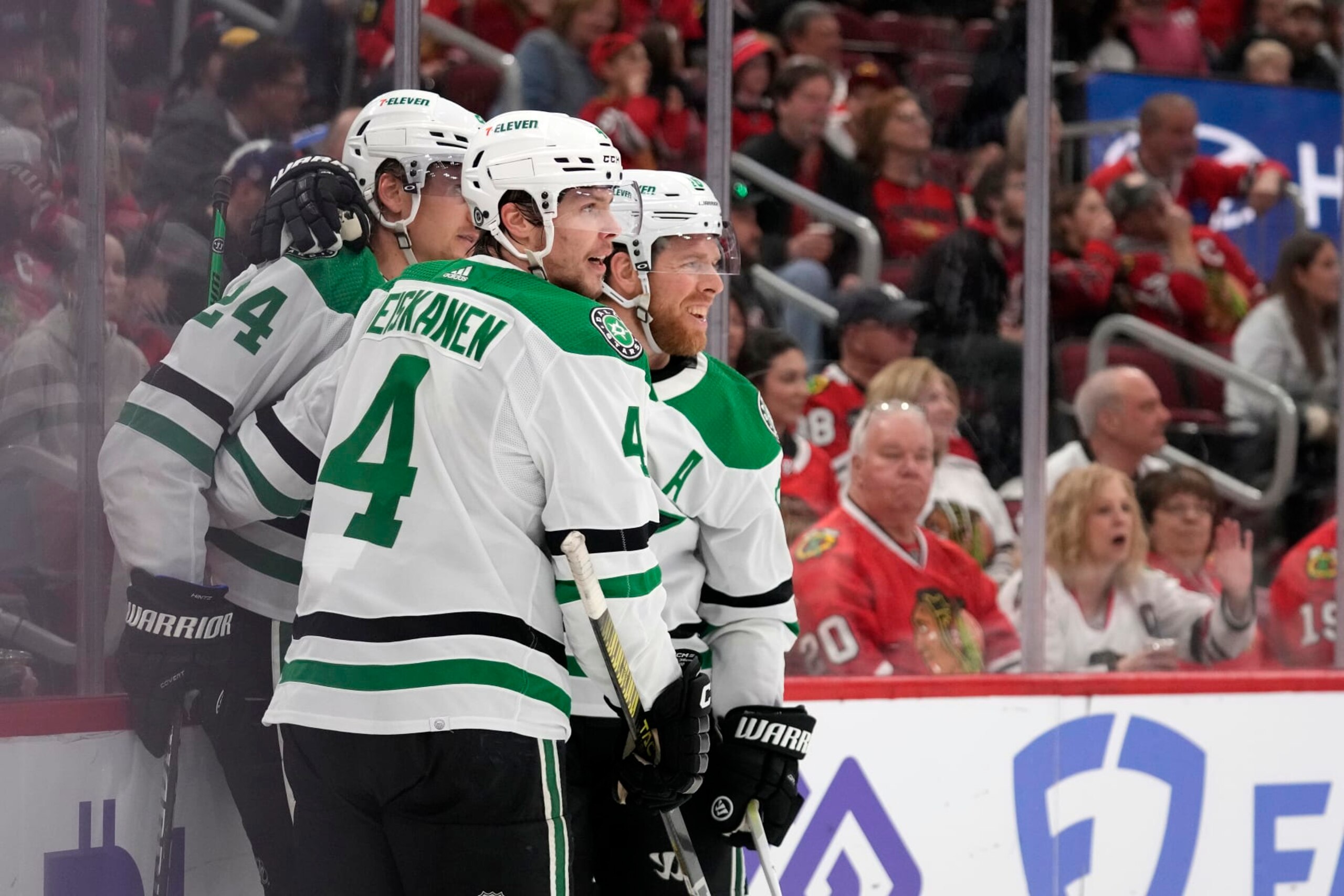 CHICAGO, ILLINOIS - APRIL 06: Roope Hintz #24 of the Dallas Stars celebrates after scoring a goal with Miro Heiskanen #4 during the second period against the Chicago Blackhawks at the United Center on April 06, 2024 in Chicago, Illinois. (Photo by Patrick McDermott/Getty Images)