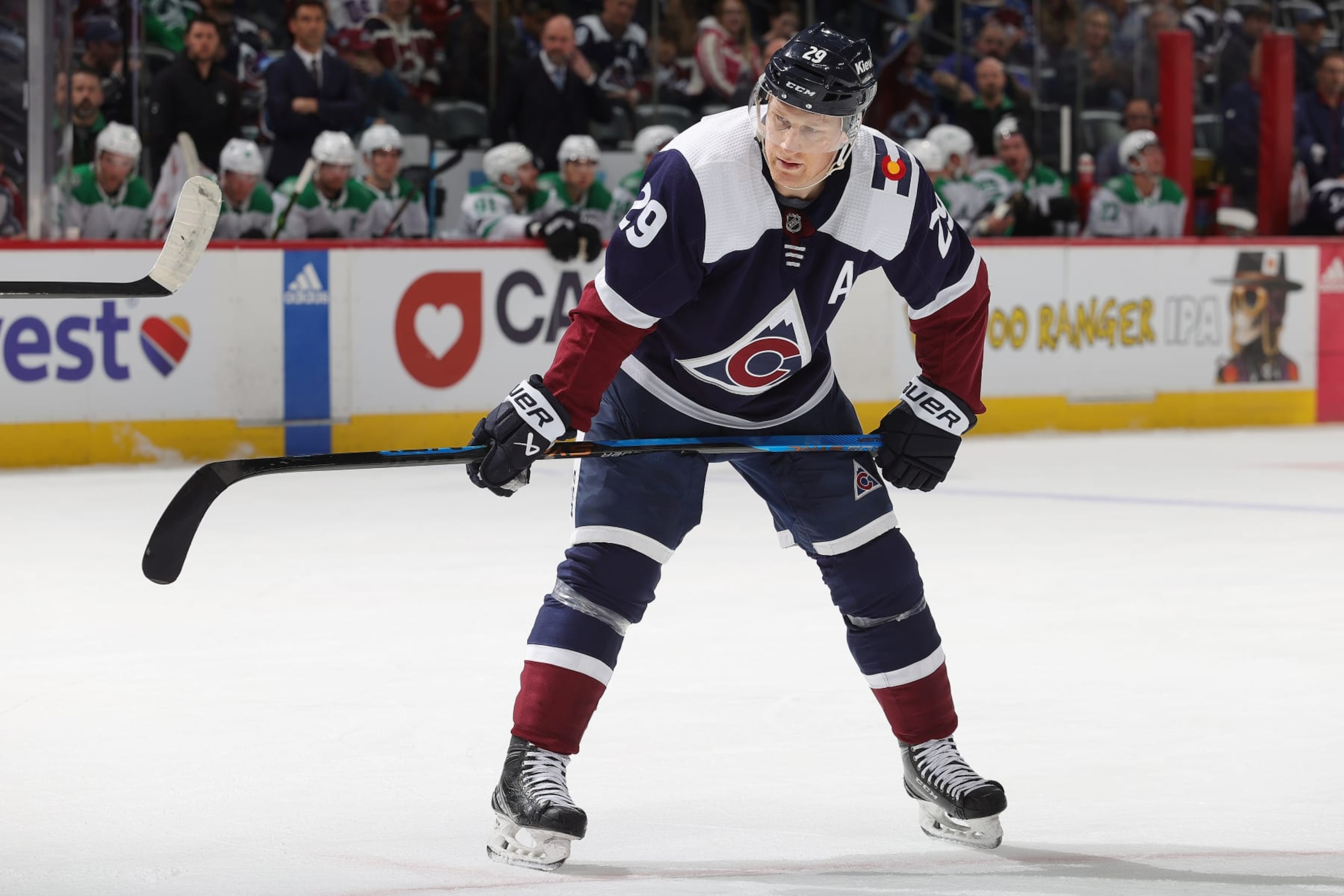 DENVER, COLORADO - APRIL 07: Nathan MacKinnon #29 of the Colorado Avalanche awaits a faceoff against the Dallas Stars at Ball Arena on April 7, 2024 in Denver, Colorado. (Photo by Michael Martin/NHLI via Getty Images)