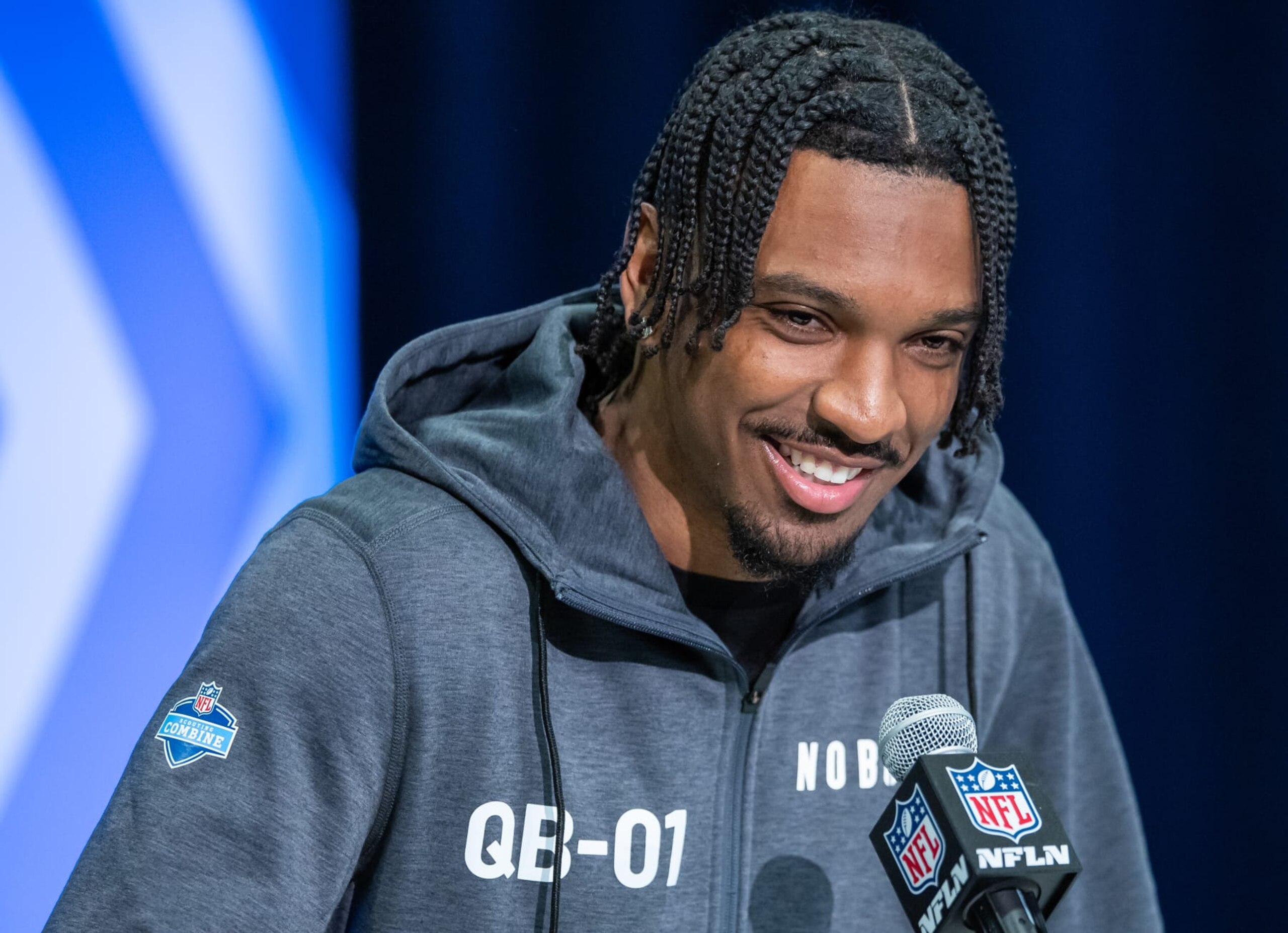 INDIANAPOLIS, INDIANA - MARCH 01: Jayden Daniels #QB01 of the LSU Tigers speaks to the media during the 2024 NFL Draft Combine at Lucas Oil Stadium on March 01, 2024 in Indianapolis, Indiana. (Photo by Michael Hickey/Getty Images)