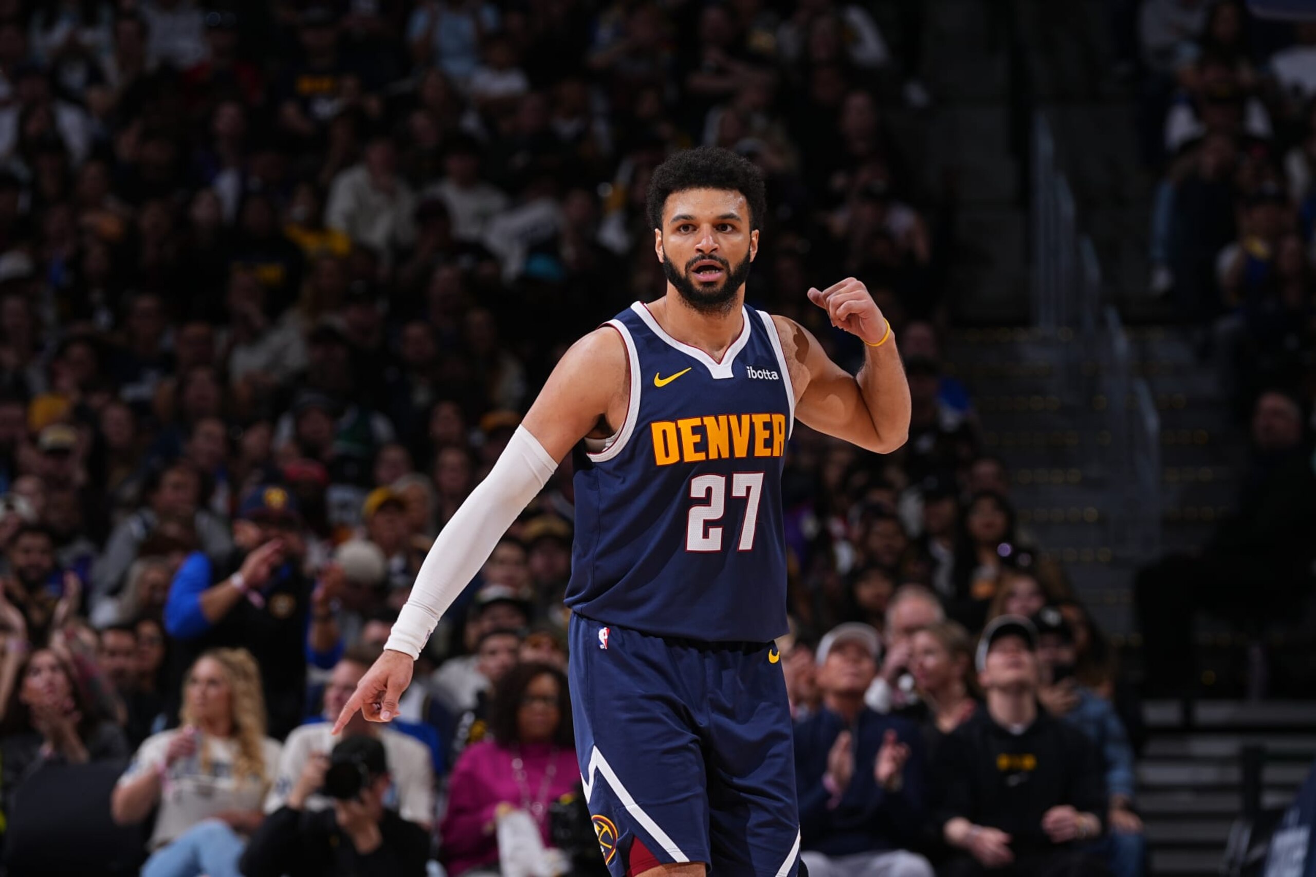 DENVER, CO - APRIL 10: Jamal Murray #27 of the Denver Nuggets looks on during the game against the Minnesota Timberwolves on April 10, 2024 at the Ball Arena in Denver, Colorado. NOTE TO USER: User expressly acknowledges and agrees that, by downloading and/or using this Photograph, user is consenting to the terms and conditions of the Getty Images License Agreement. Mandatory Copyright Notice: Copyright 2024 NBAE (Photo by Bart Young/NBAE via Getty Images)