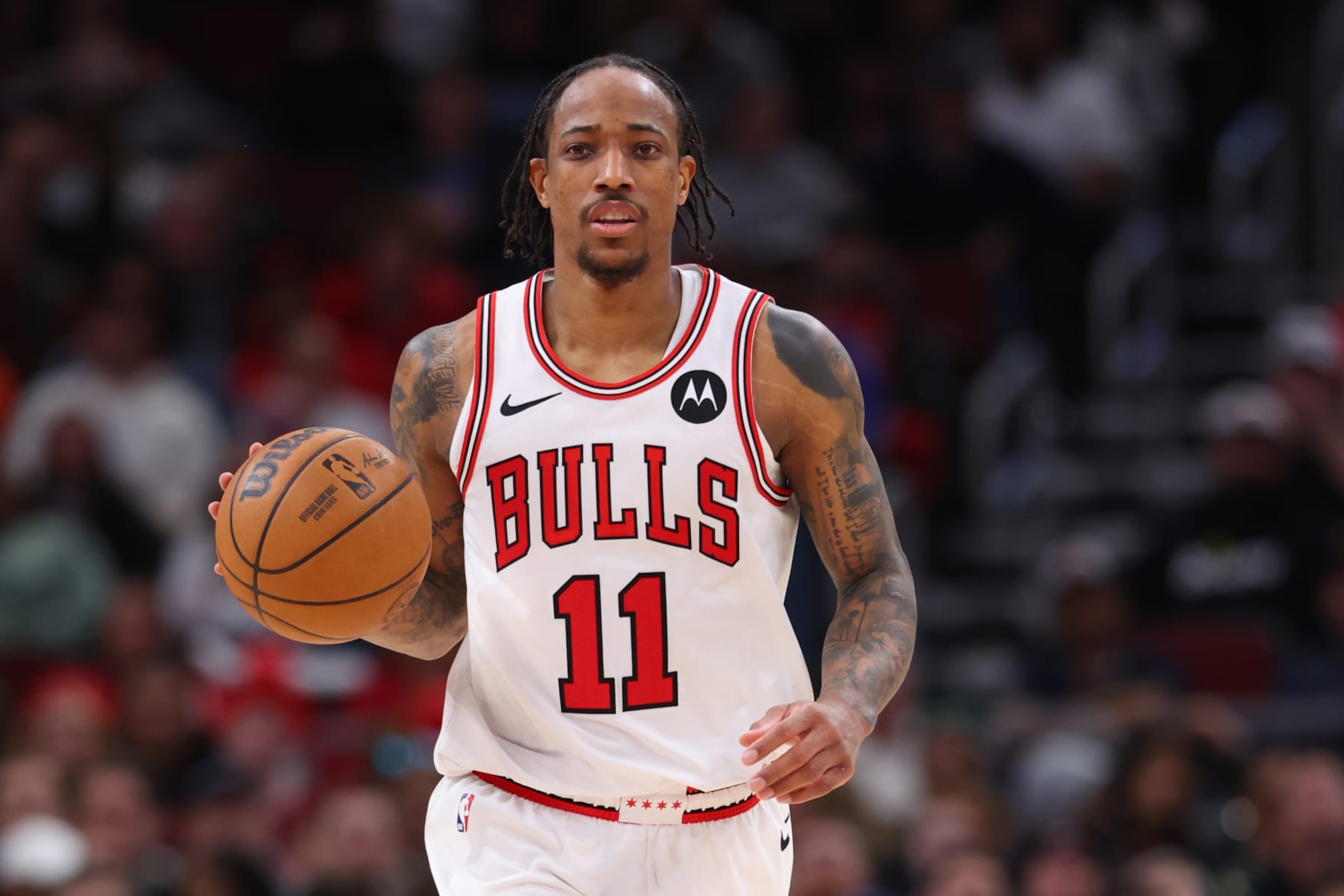 CHICAGO, ILLINOIS - APRIL 09: DeMar DeRozan #11 of the Chicago Bulls dribbles up the court against the New York Knicks during the second half at the United Center on April 09, 2024 in Chicago, Illinois. NOTE TO USER: User expressly acknowledges and agrees that, by downloading and or using this photograph, User is consenting to the terms and conditions of the Getty Images License Agreement. (Photo by Michael Reaves/Getty Images) CHICAGO, ILLINOIS - APRIL 09: DeMar DeRozan #11 of the Chicago Bulls dribbles up the court against the New York Knicks during the second half at the United Center on April 09, 2024 in Chicago, Illinois. NOTE TO USER: User expressly acknowledges and agrees that, by downloading and or using this photograph, User is consenting to the terms and conditions of the Getty Images License Agreement. (Photo by Michael Reaves/Getty Images)
