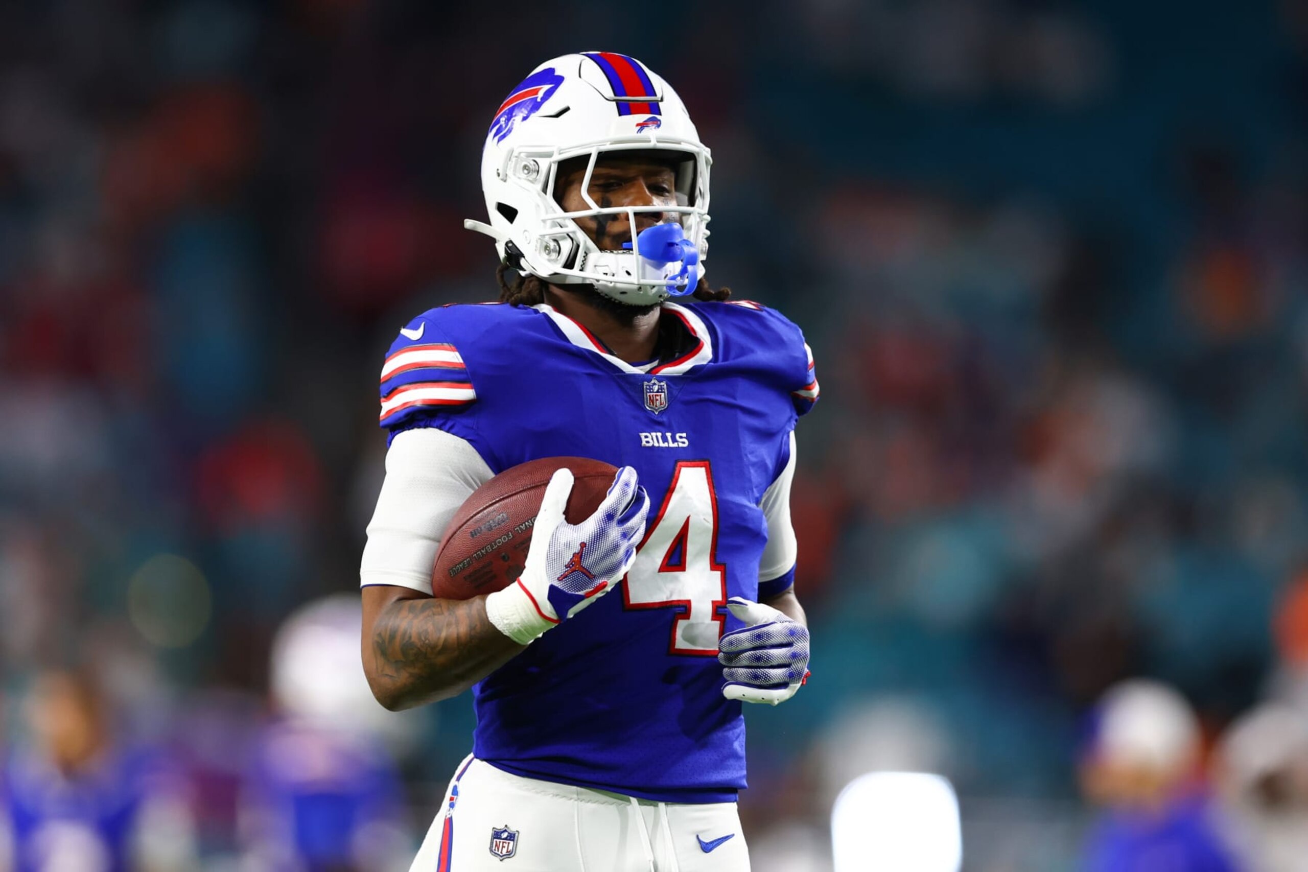 MIAMI GARDENS, FLORIDA - JANUARY 07: James Cook #4 of the Buffalo Bills warms up prior to a game against the Miami Dolphins at Hard Rock Stadium on January 07, 2024 in Miami Gardens, Florida. (Photo by Megan Briggs/Getty Images)