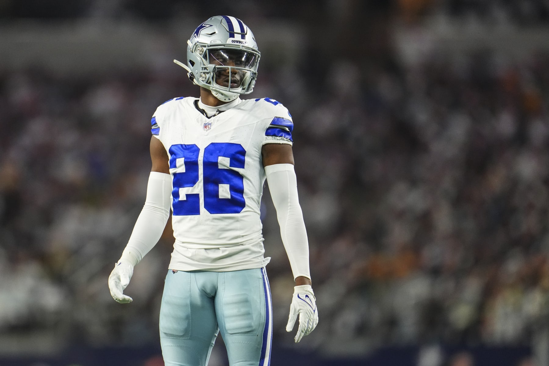 DALLAS, TX - JANUARY 14: DaRon Bland #26 of the Dallas Cowboys looks on from the field during an NFL wild-card playoff football game against the Green Bay Packers at AT&T Stadium on January 14, 2024 in Dallas, Texas. (Photo by Cooper Neill/Getty Images)