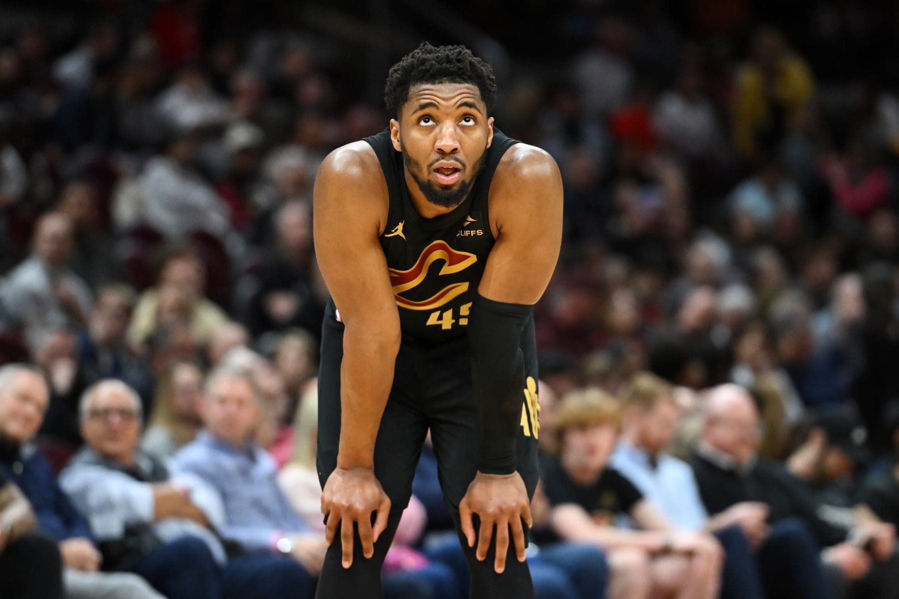 CLEVELAND, OHIO - APRIL 10: Donovan Mitchell #45 of the Cleveland Cavaliers looks on during the second half against the Memphis Grizzlies at Rocket Mortgage Fieldhouse on April 10, 2024 in Cleveland, Ohio. NOTE TO USER: User expressly acknowledges and agrees that, by downloading and or using this photograph, User is consenting to the terms and conditions of the Getty Images License Agreement. (Photo by Nick Cammett/Getty Images)