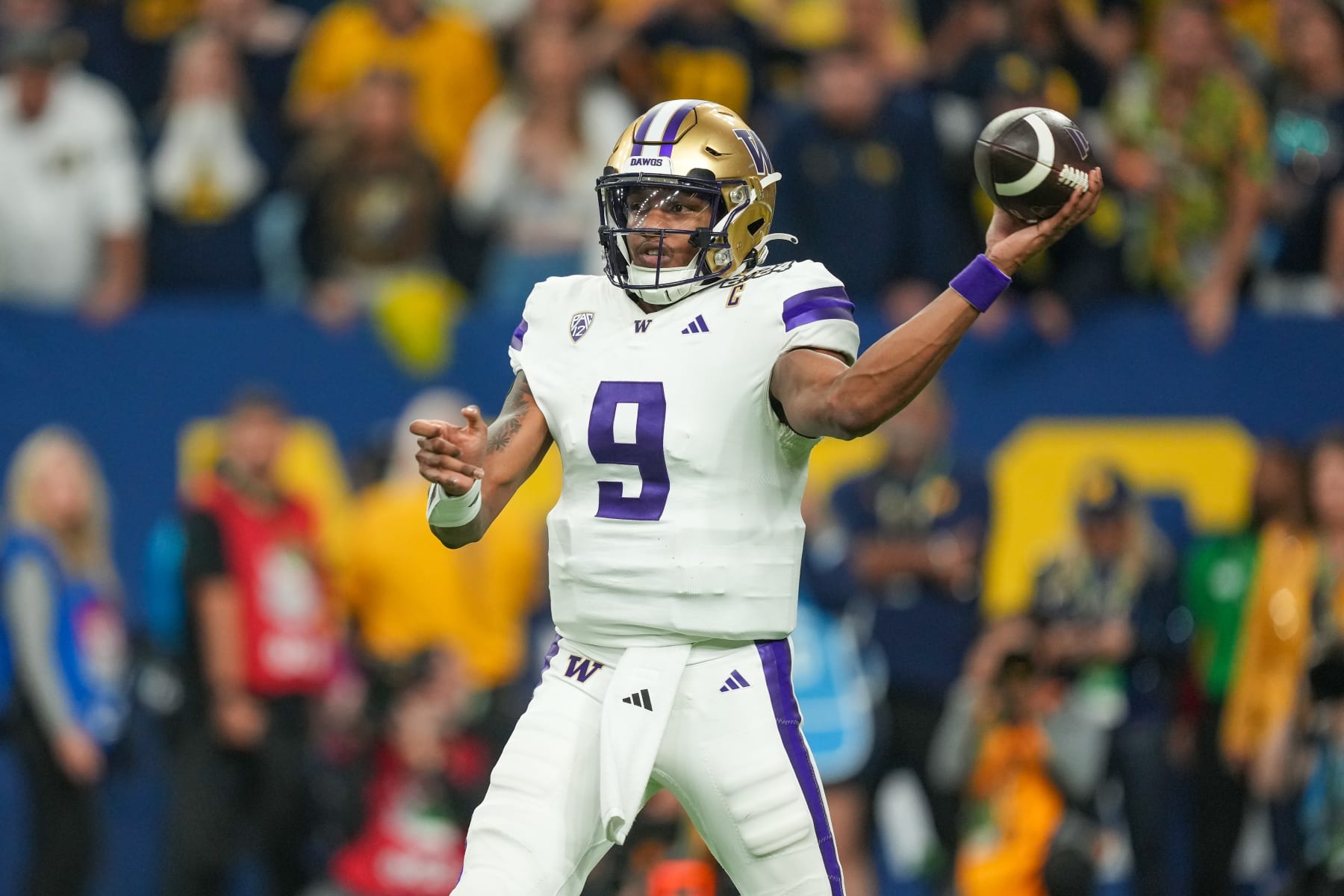 HOUSTON, TX - JANUARY 08: Washington Huskies quarterback Michael Penix Jr. (9) throws a pass during the CFP National Championship game between the Michigan Wolverines and Washington Huskies on January 8, 2024 at NRG Stadium in Houston, Texas. (Photo by Daniel Dunn/Icon Sportswire via Getty Images)