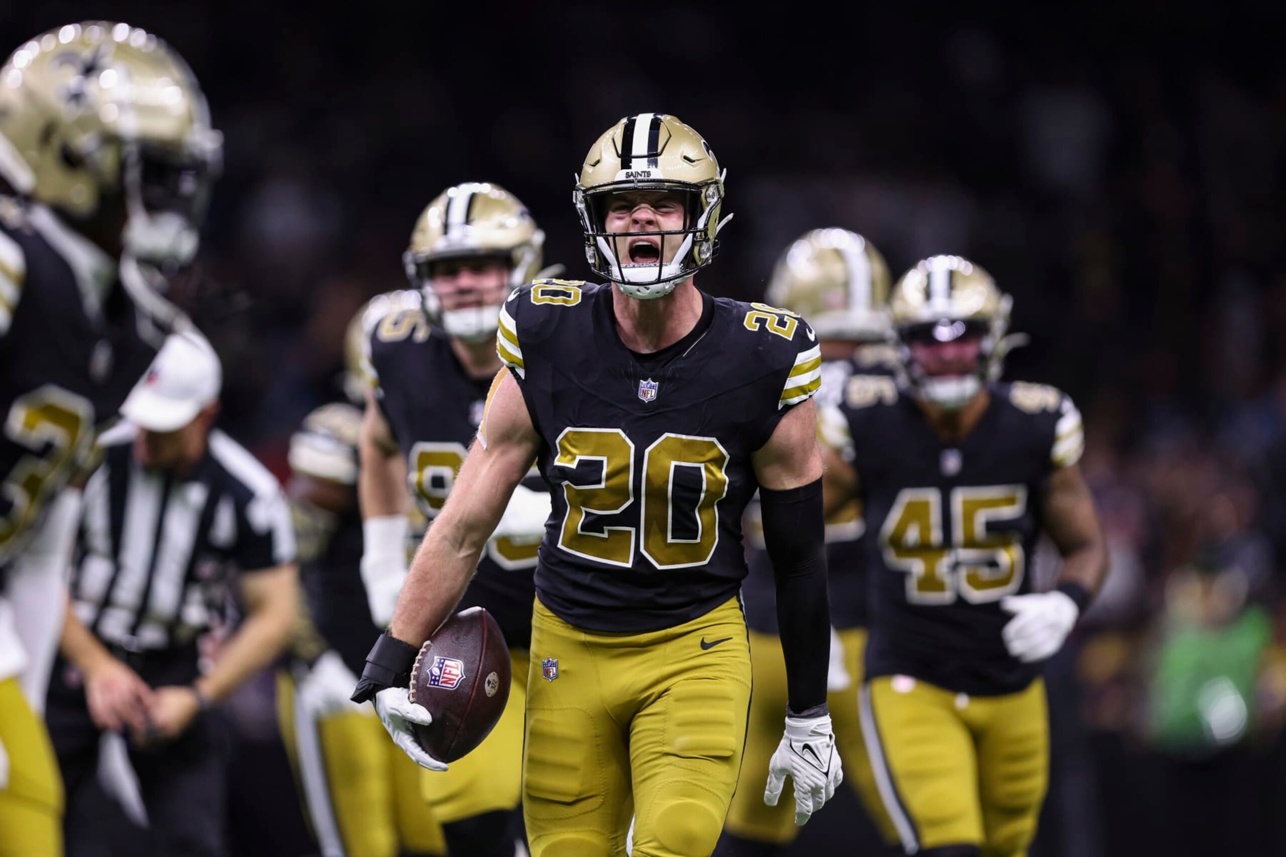NEW ORLEANS, LA - DECEMBER 10: Pete Werner #20 of the New Orleans Saints celebrates during an NFL football game against the Carolina Panthers at Caesars Superdome on December 10, 2023 in New Orleans, LA. (Photo by Perry Knotts/Getty Images)
