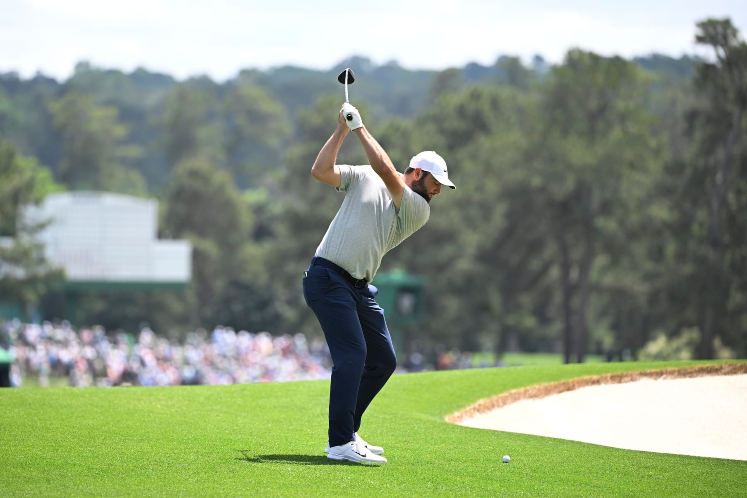 AUGUSTA, GEORGIA - APRIL 11: Scottie Scheffler hits his second shot from the fairway on the second hole during the first round of Masters Tournament at Augusta National Golf Club on April 11, 2024 in Augusta, Georgia. (Photo by Ben Jared/PGA TOUR via Getty Images)