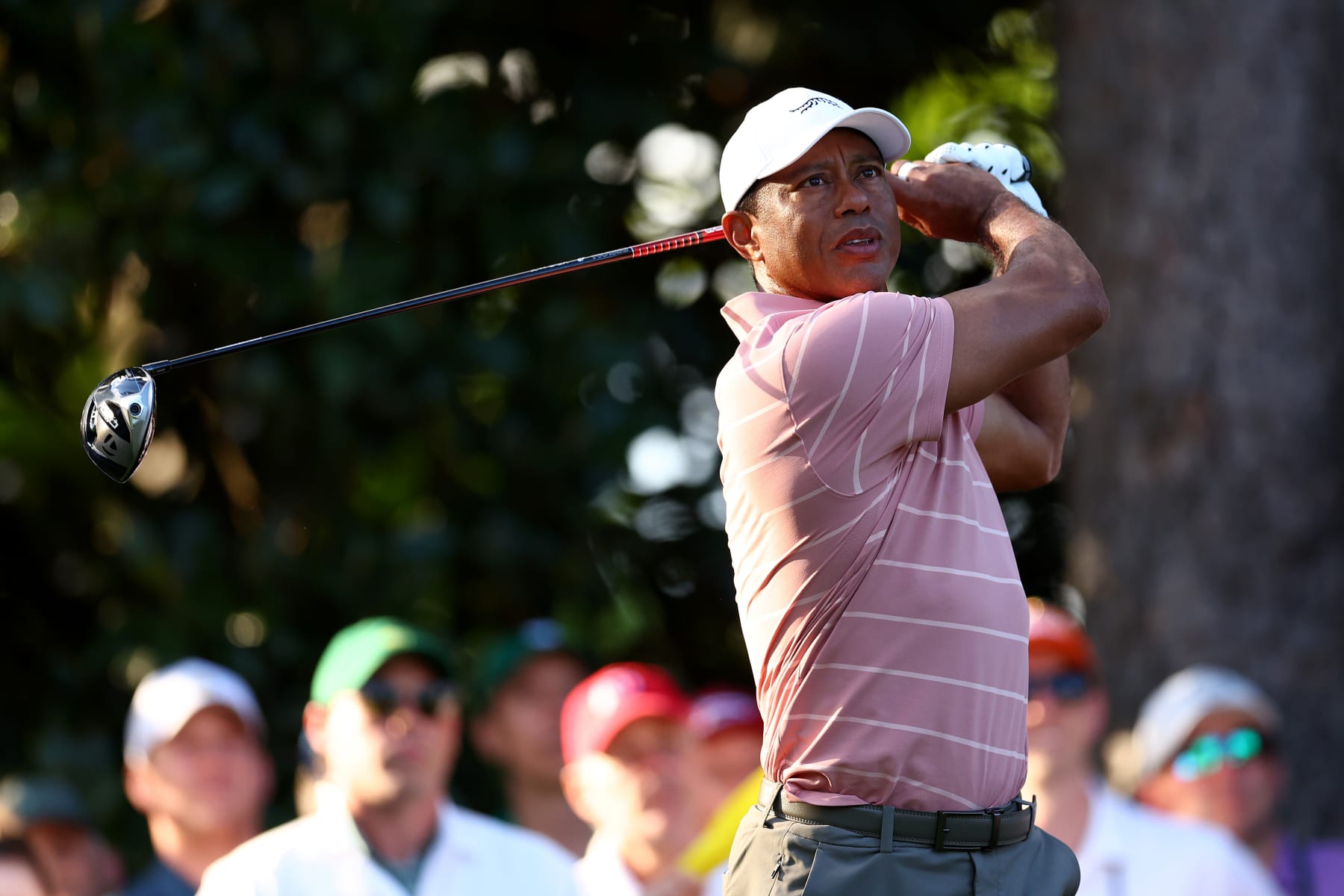 AUGUSTA, GEORGIA - APRIL 11: Tiger Woods of the United States plays his shot from the tenth tee during the first round of the 2024 Masters Tournament at Augusta National Golf Club on April 11, 2024 in Augusta, Georgia.  (Photo by Maddie Meyer/Getty Images)
