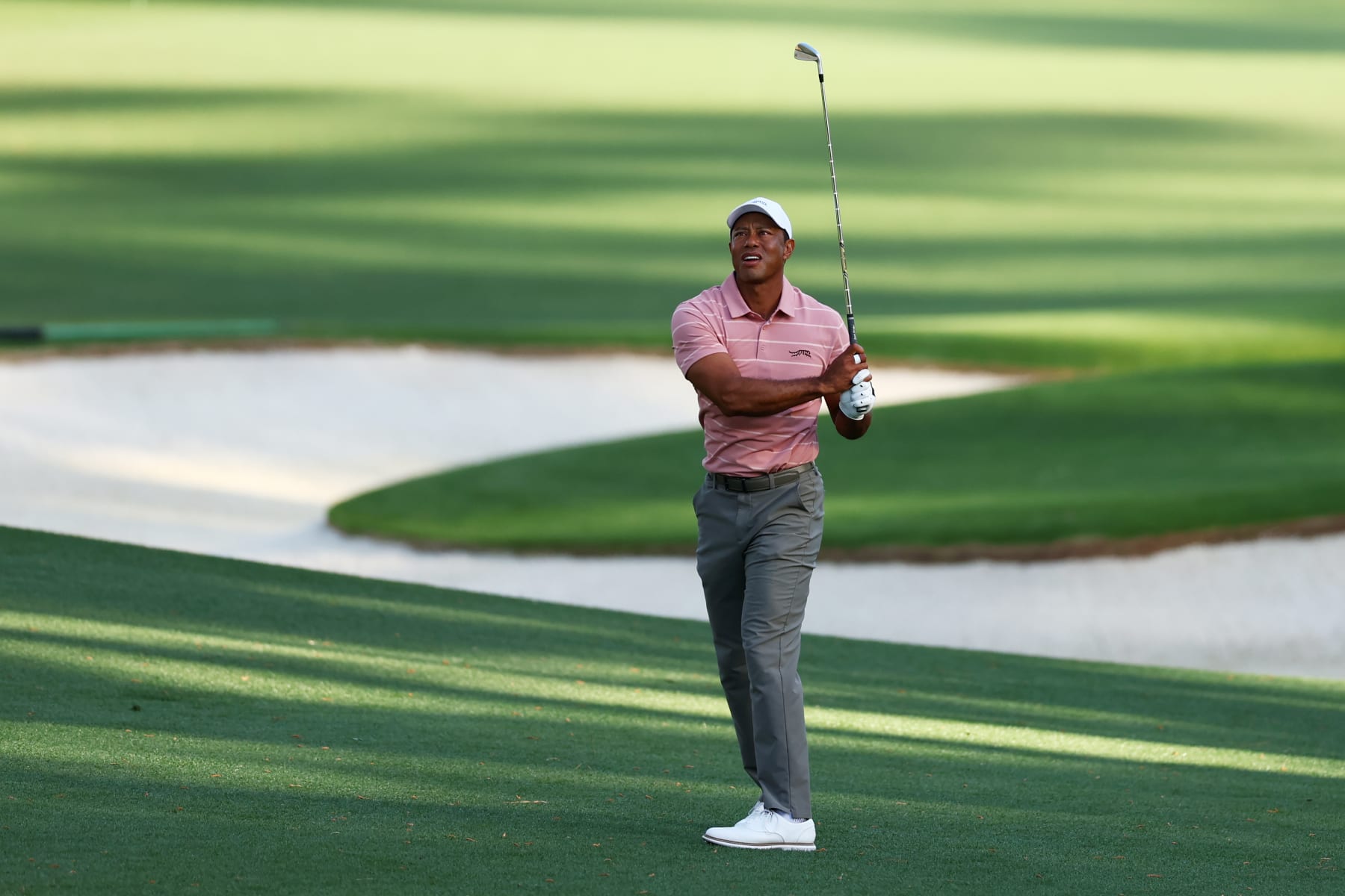 AUGUSTA, GEORGIA - APRIL 11: Tiger Woods of the United States plays a shot on the eighth hole during the first round of the 2024 Masters Tournament at Augusta National Golf Club on April 11, 2024 in Augusta, Georgia.  (Photo by Maddie Meyer/Getty Images)