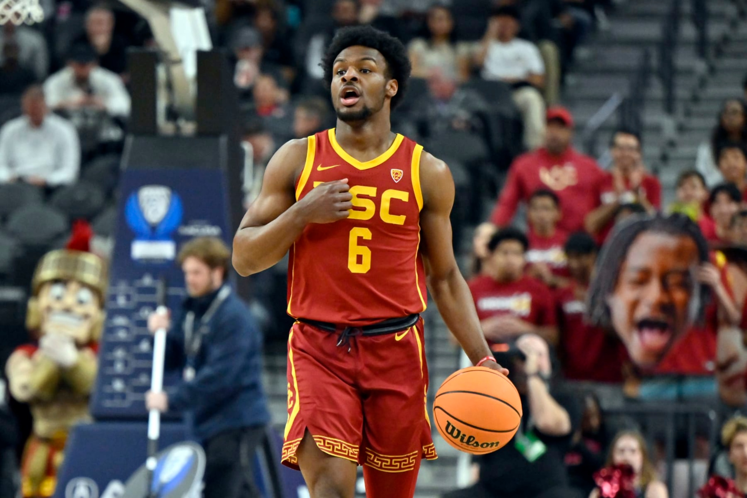 LAS VEGAS, NEVADA - MARCH 13: Bronny James #6 of the USC Trojans handles the ball in the first half of a first round game against the Washington Huskies during the Pac-12 Conference basketball tournament at T-Mobile Arena on March 13, 2024 in Las Vegas, Nevada. The Trojans defeated the Huskies 80-74. (Photo by David Becker/Getty Images)
