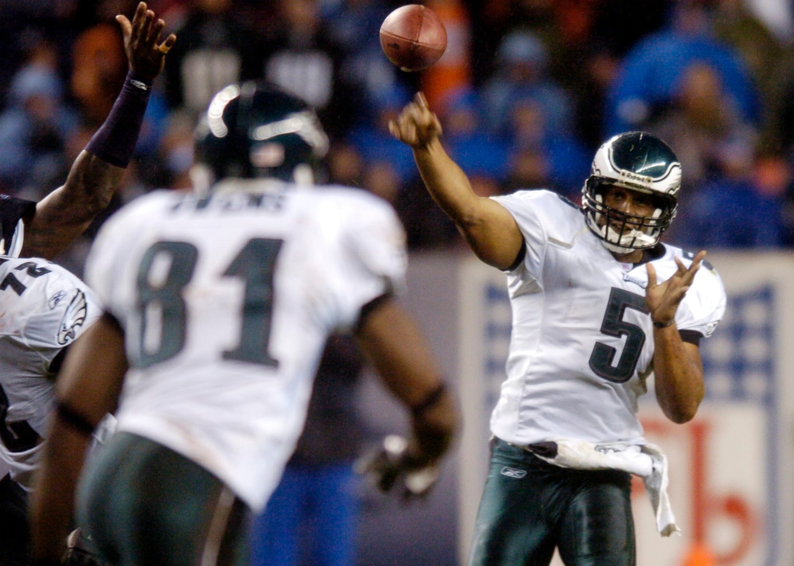 DENVER, CO OCTOBER 30, 2005 - Philadelfia Eagles Donovan McNabb throws the ball to Terrell Owens in the 4th quater of the game against Denver Broncos at Invesco Field Mile high on Sunday. Denver own 49-21. (DENVER POST PHOTO BY HYOUNG CHANG ) (Photo By Hyoung Chang/The Denver Post via Getty Images) DENVER, CO OCTOBER 30, 2005 - Philadelfia Eagles Donovan McNabb throws the ball to Terrell Owens in the 4th quater of the game against Denver Broncos at Invesco Field Mile high on Sunday. Denver own 49-21. (DENVER POST PHOTO BY HYOUNG CHANG ) (Photo By Hyoung Chang/The Denver Post via Getty Images)