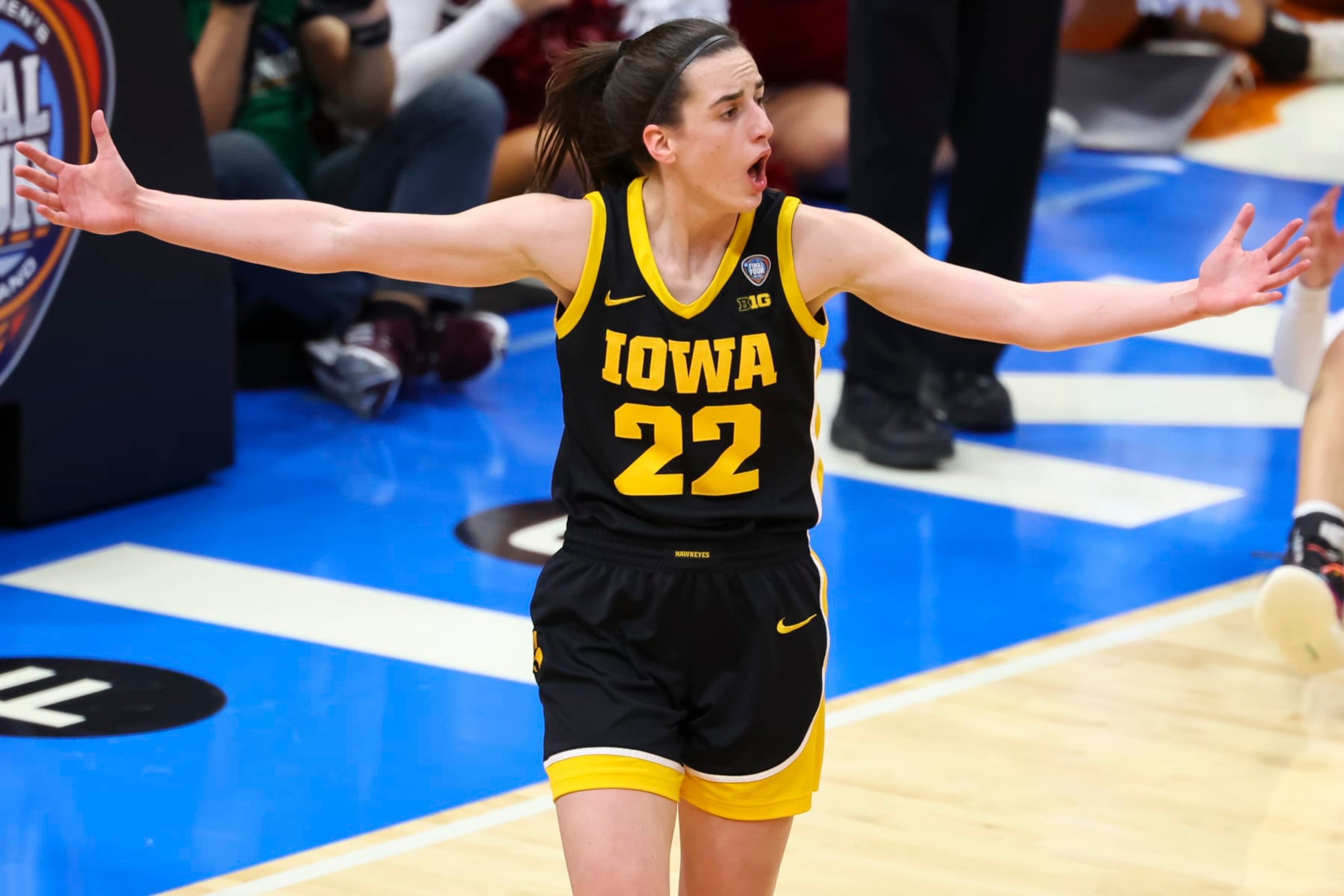 CLEVELAND, OHIO - APRIL 07: Caitlin Clark #22 of the Iowa Hawkeyes reacts to a call against the South Carolina Gamecocks during the NCAA Women's Basketball Tournament National Championship at Rocket Mortgage Fieldhouse on April 7, 2024 in Cleveland, Ohio. (Photo by C. Morgan Engel/NCAA Photos via Getty Images) CLEVELAND, OHIO - APRIL 07: Caitlin Clark #22 of the Iowa Hawkeyes reacts to a call against the South Carolina Gamecocks during the NCAA Women's Basketball Tournament National Championship at Rocket Mortgage Fieldhouse on April 7, 2024 in Cleveland, Ohio. (Photo by C. Morgan Engel/NCAA Photos via Getty Images)