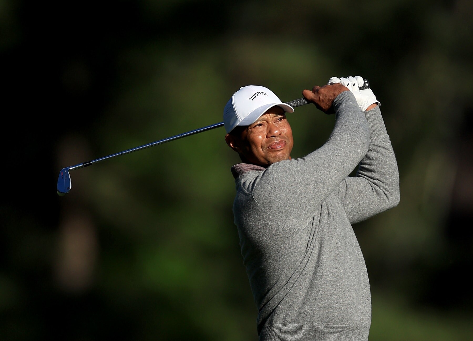 AUGUSTA, GEORGIA - APRIL 12: Tiger Woods of The United States plays his second shot on the 17th hole during the completion of the weather delayed first round of the 2024 Masters Tournament at Augusta National Golf Club on April 12, 2024 in Augusta, Georgia. (Photo by David Cannon/Getty Images)