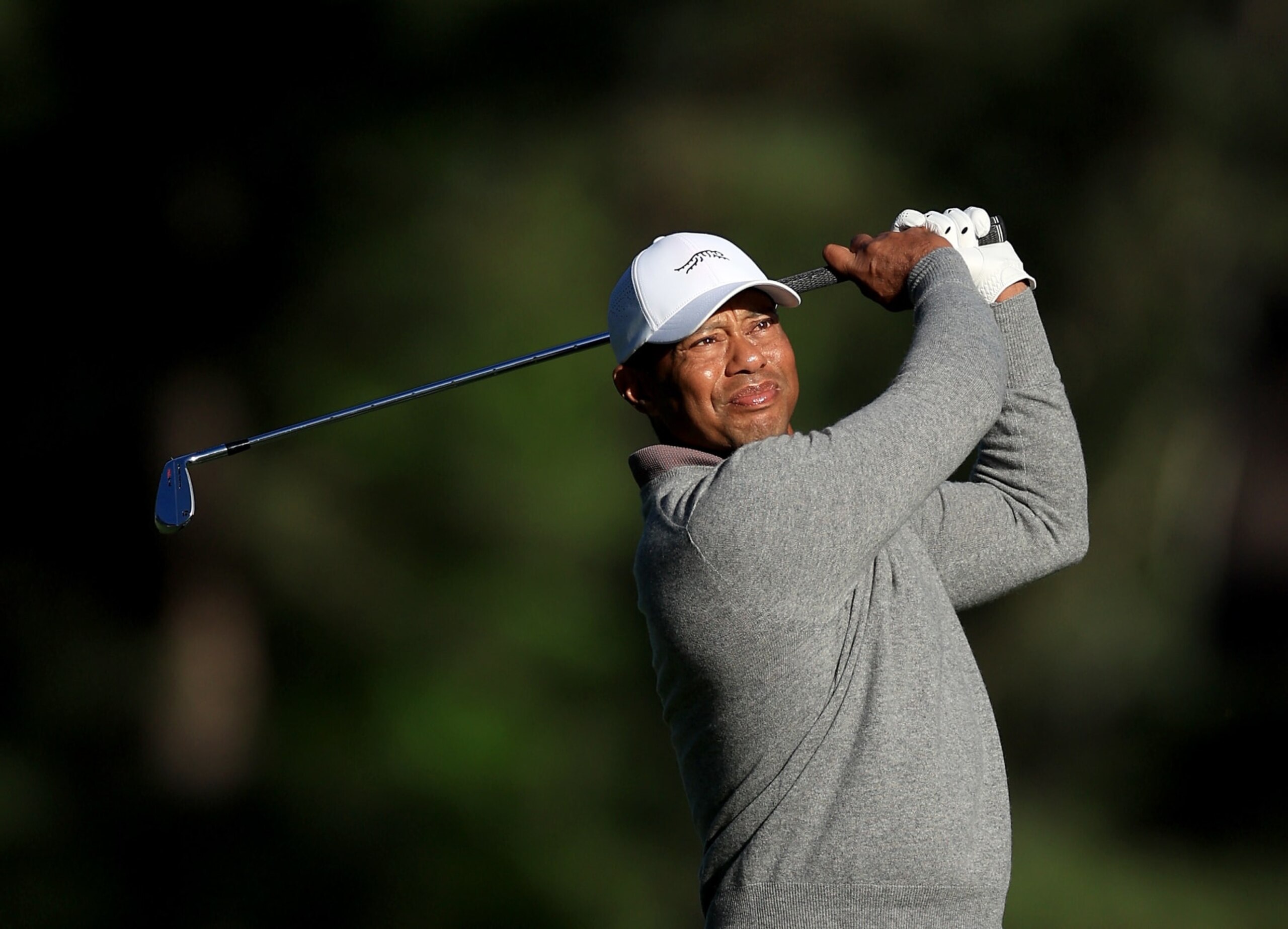 AUGUSTA, GEORGIA - APRIL 12: Tiger Woods of The United States plays his second shot on the 17th hole during the completion of the weather delayed first round of the 2024 Masters Tournament at Augusta National Golf Club on April 12, 2024 in Augusta, Georgia. (Photo by David Cannon/Getty Images)