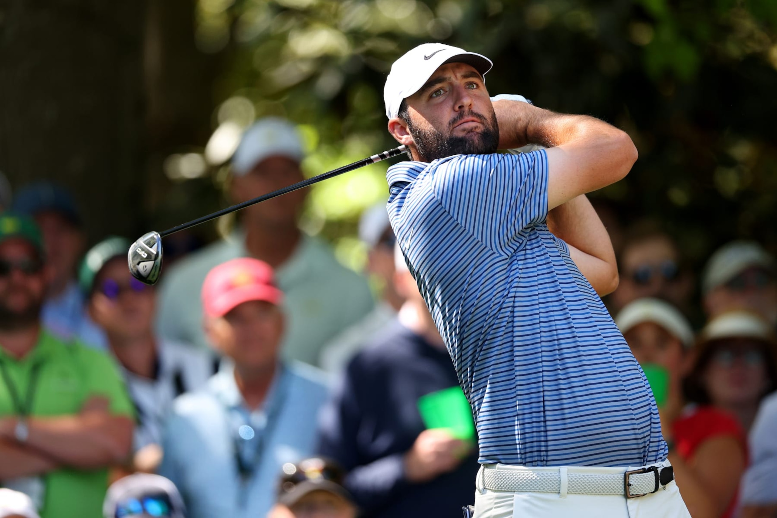 AUGUSTA, GEORGIA - APRIL 12: Scottie Scheffler of the United States plays his shot from the seventh tee during the second round of the 2024 Masters Tournament at Augusta National Golf Club on April 12, 2024 in Augusta, Georgia. (Photo by Andrew Redington/Getty Images) AUGUSTA, GEORGIA - APRIL 12: Scottie Scheffler of the United States plays his shot from the seventh tee during the second round of the 2024 Masters Tournament at Augusta National Golf Club on April 12, 2024 in Augusta, Georgia. (Photo by Andrew Redington/Getty Images)