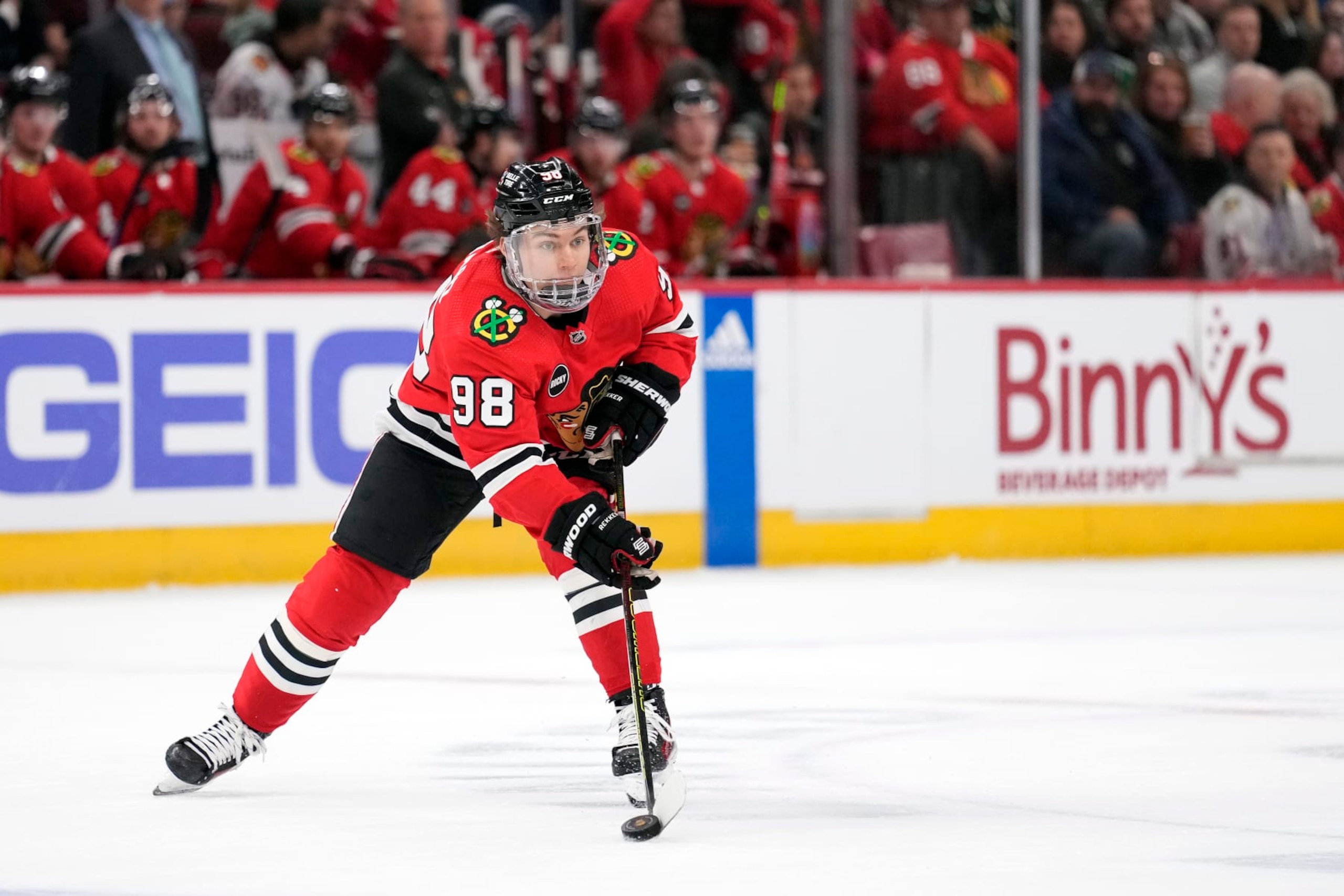 CHICAGO, ILLINOIS - APRIL 06: Connor Bedard #98 of the Chicago Blackhawks skates with the puck during the first period against the Dallas Stars at the United Center on April 06, 2024 in Chicago, Illinois. (Photo by Patrick McDermott/Getty Images)