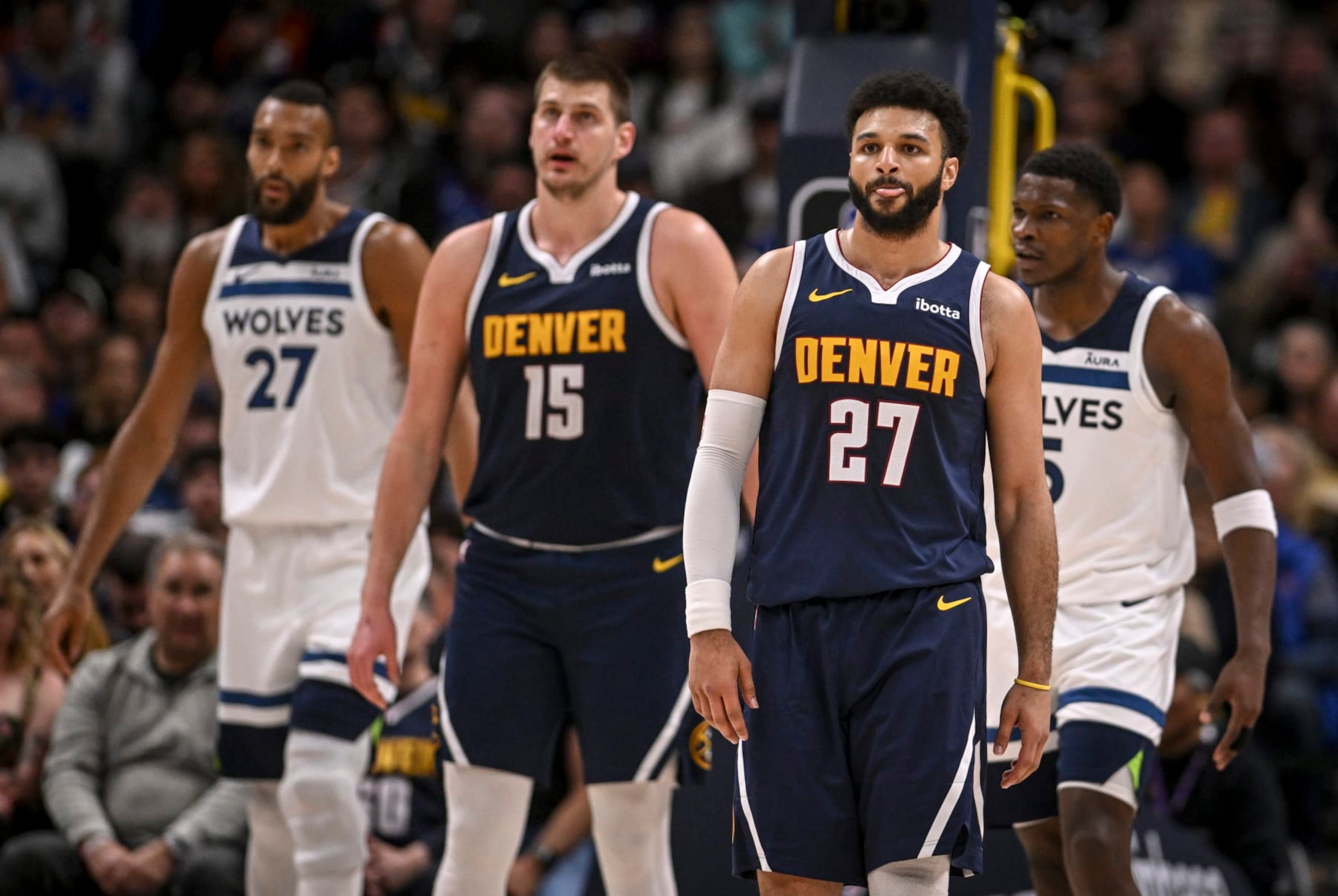 DENVER, CO - APRIL 10: Nikola Jokic (15) and Jamal Murray (27) of the Denver Nuggets size up with Rudy Gobert (27) and Anthony Edwards (5) of the Minnesota Timberwolves during the third quarter at Ball Arena in Denver on Wednesday, April 10, 2024. (Photo by AAron Ontiveroz/The Denver Post) DENVER, CO - APRIL 10: Nikola Jokic (15) and Jamal Murray (27) of the Denver Nuggets size up with Rudy Gobert (27) and Anthony Edwards (5) of the Minnesota Timberwolves during the third quarter at Ball Arena in Denver on Wednesday, April 10, 2024. (Photo by AAron Ontiveroz/The Denver Post)