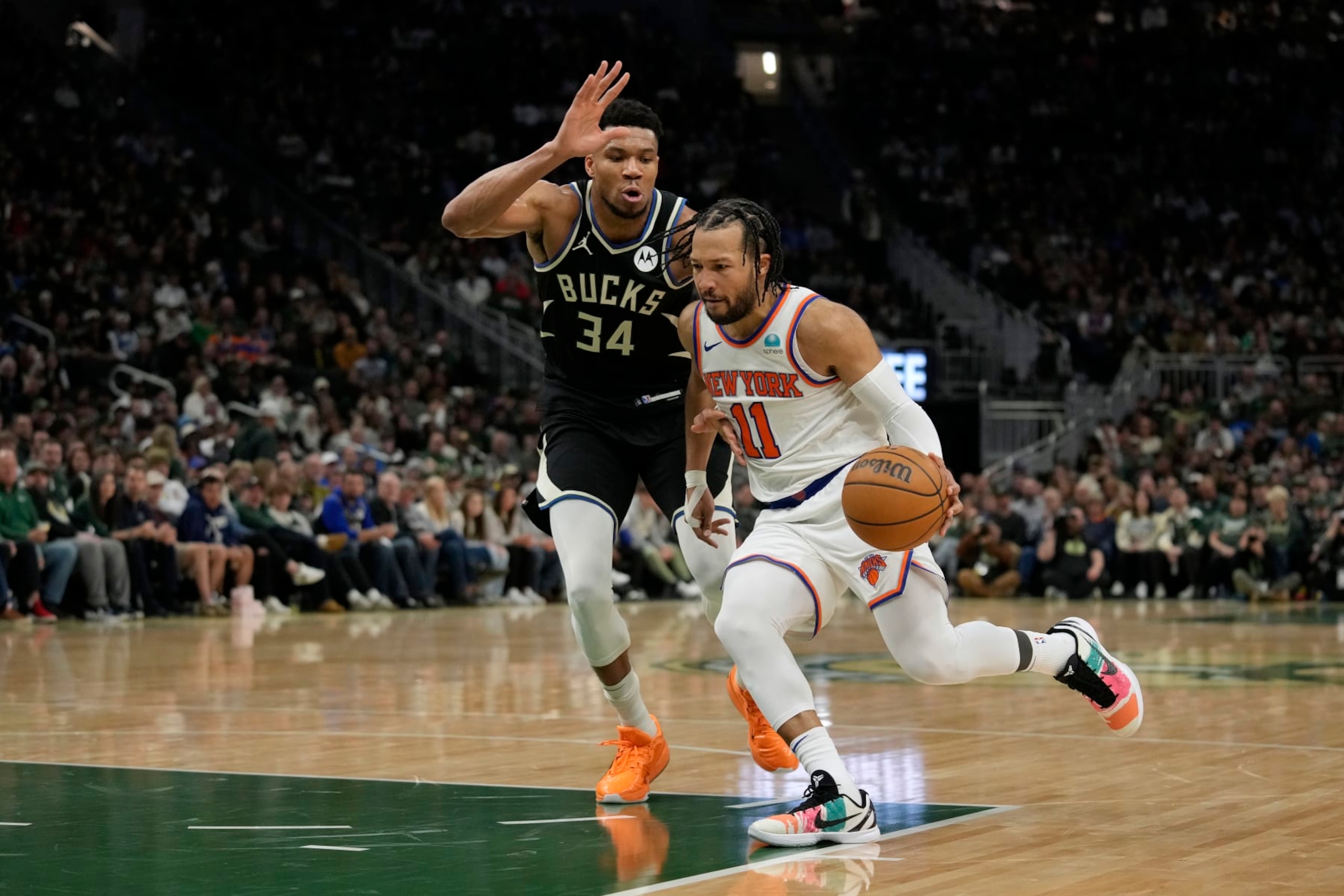MILWAUKEE, WISCONSIN - APRIL 07: Jalen Brunson #11 of the New York Knicks dribbles the ball against Giannis Antetokounmpo #34 of the Milwaukee Bucks during the second half at Fiserv Forum on April 07, 2024 in Milwaukee, Wisconsin. NOTE TO USER: User expressly acknowledges and agrees that, by downloading and or using this photograph, User is consenting to the terms and conditions of the Getty Images License Agreement. (Photo by Patrick McDermott/Getty Images) MILWAUKEE, WISCONSIN - APRIL 07: Jalen Brunson #11 of the New York Knicks dribbles the ball against Giannis Antetokounmpo #34 of the Milwaukee Bucks during the second half at Fiserv Forum on April 07, 2024 in Milwaukee, Wisconsin. NOTE TO USER: User expressly acknowledges and agrees that, by downloading and or using this photograph, User is consenting to the terms and conditions of the Getty Images License Agreement. (Photo by Patrick McDermott/Getty Images)