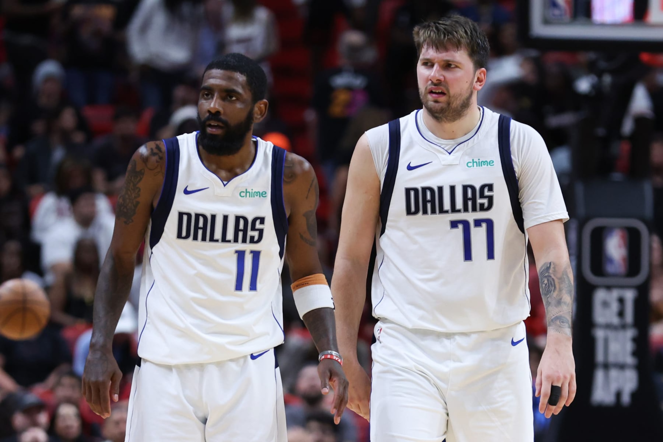 MIAMI, FLORIDA - APRIL 10: Kyrie Irving #11 and Luka Doncic #77 of the Dallas Mavericks look on during the fourth quarter of the game against the Miami Heat at Kaseya Center on April 10, 2024 in Miami, Florida. NOTE TO USER: User expressly acknowledges and agrees that, by downloading and or using this photograph, User is consenting to the terms and conditions of the Getty Images License Agreement. (Photo by Megan Briggs/Getty Images) MIAMI, FLORIDA - APRIL 10: Kyrie Irving #11 and Luka Doncic #77 of the Dallas Mavericks look on during the fourth quarter of the game against the Miami Heat at Kaseya Center on April 10, 2024 in Miami, Florida. NOTE TO USER: User expressly acknowledges and agrees that, by downloading and or using this photograph, User is consenting to the terms and conditions of the Getty Images License Agreement. (Photo by Megan Briggs/Getty Images)