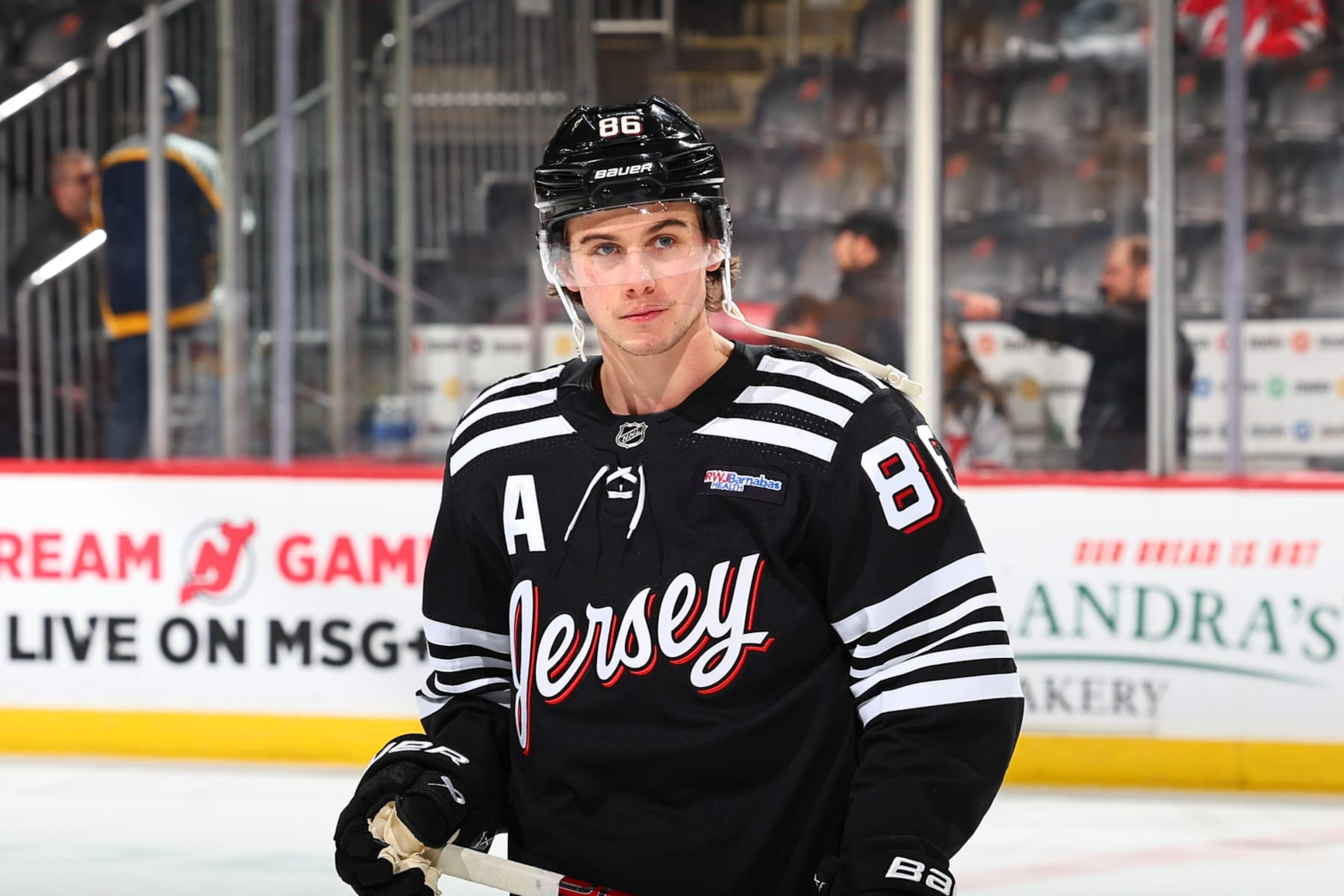 NEWARK, NJ - APRIL 07:  Jack Hughes #86 of the New Jersey Devils skates during warm up prior to the game against the Nashville Predators at the Prudential Center on April 7, 2024 in Newark, New Jersey.  (Photo by Rich Graessle/NHLI via Getty Images)