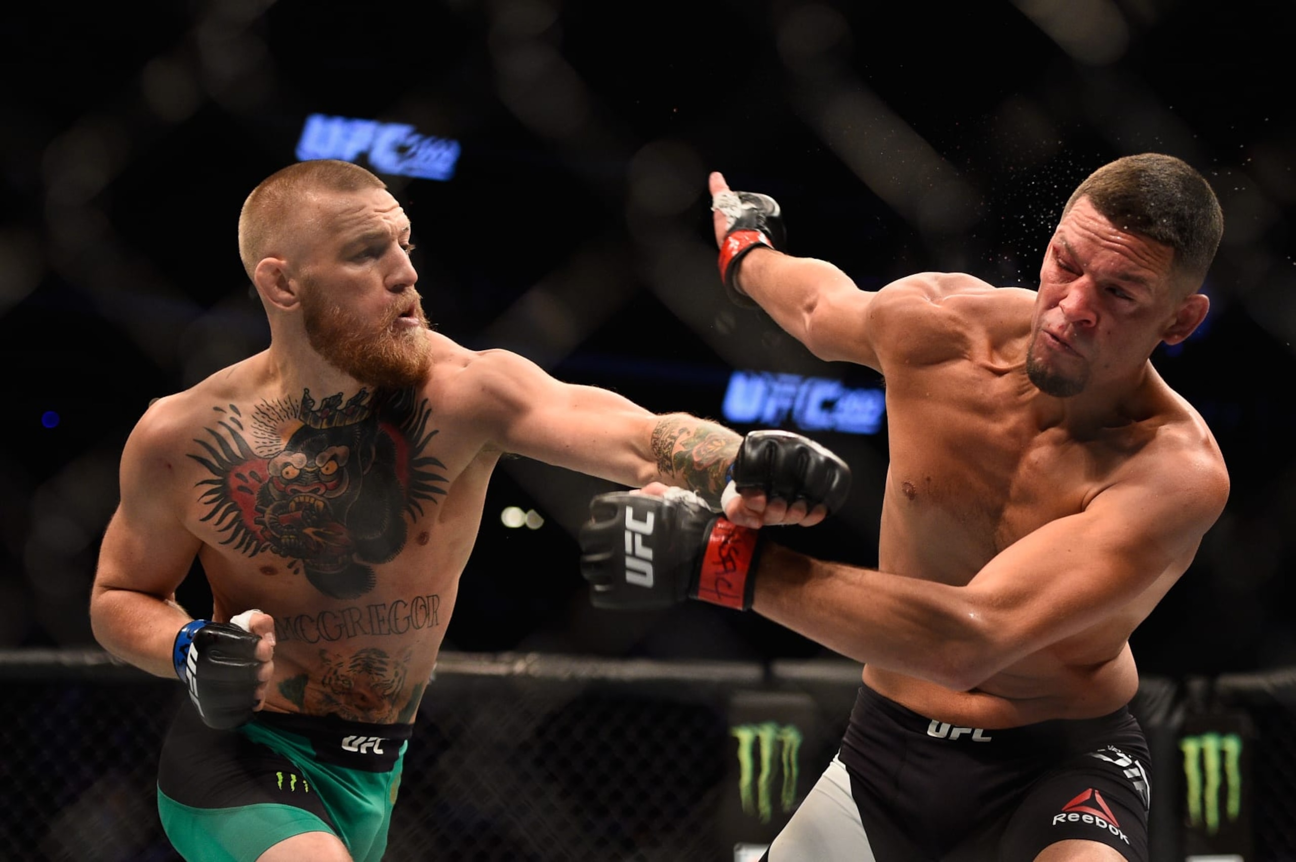 LAS VEGAS, NV - AUGUST 20: Nate Diaz fights Conor McGregor of Ireland in their welterweight bout during the UFC 202 event at T-Mobile Arena on August 20, 2016 in Las Vegas, Nevada. (Photo by Jeff Bottari/Zuffa LLC/Zuffa LLC via Getty Images) LAS VEGAS, NV - AUGUST 20: Nate Diaz fights Conor McGregor of Ireland in their welterweight bout during the UFC 202 event at T-Mobile Arena on August 20, 2016 in Las Vegas, Nevada. (Photo by Jeff Bottari/Zuffa LLC/Zuffa LLC via Getty Images)